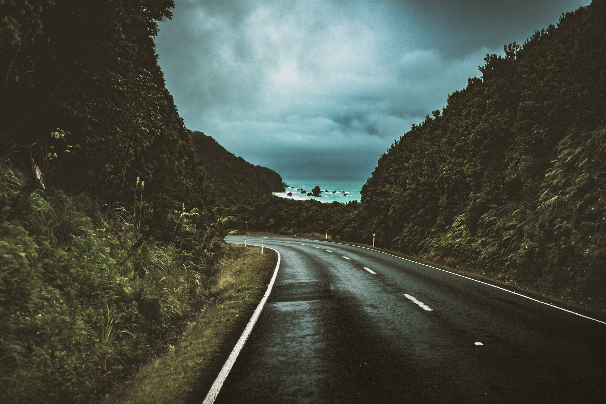 Sony a7 II + Tamron 18-270mm F3.5-6.3 Di II PZD sample photo. Dark road to haast pass photography