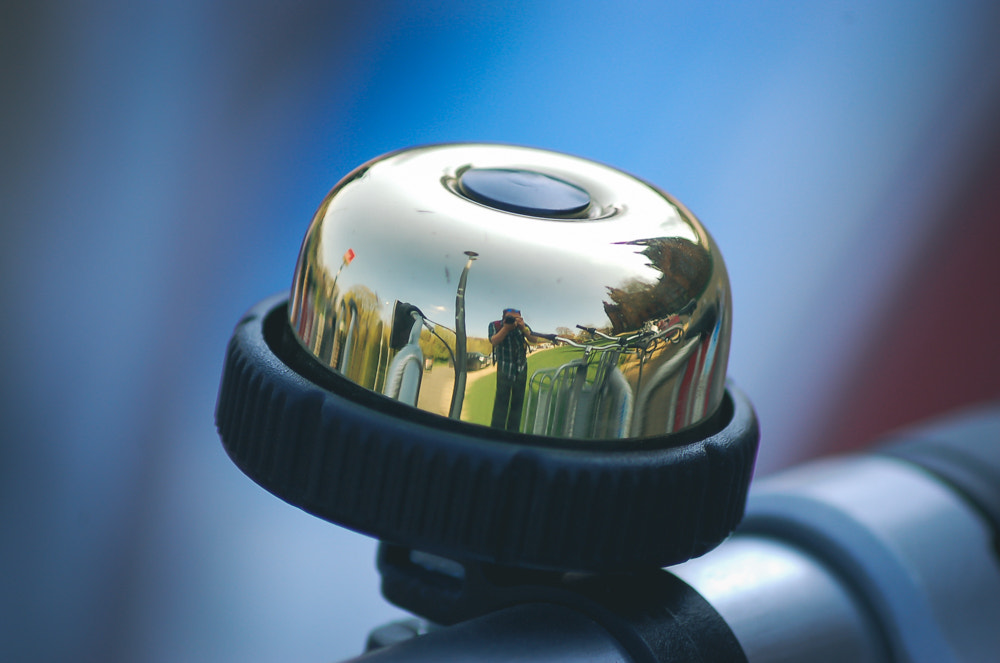 Nikon D50 sample photo. Bike bell reflection photography