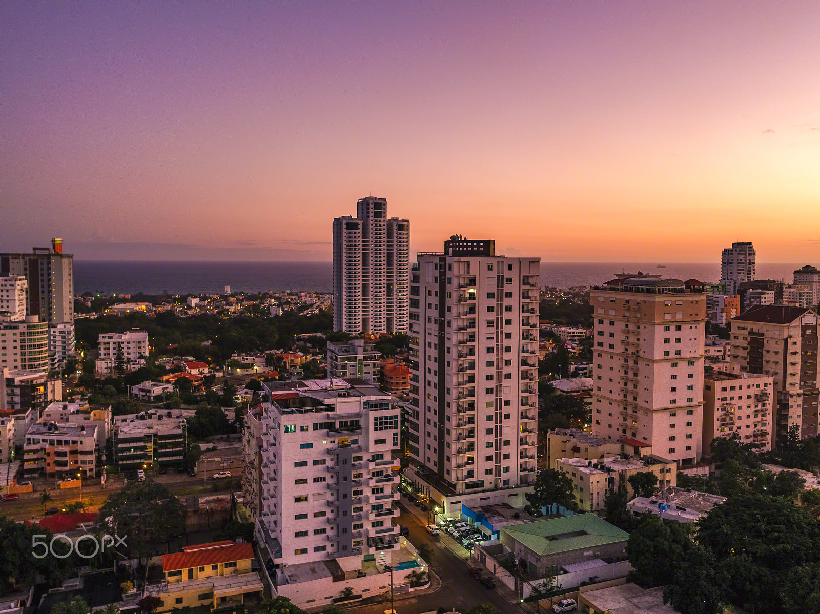 DJI FC6520 + DJI MFT 15mm F1.7 ASPH sample photo. Pink sunset over santo domingo photography