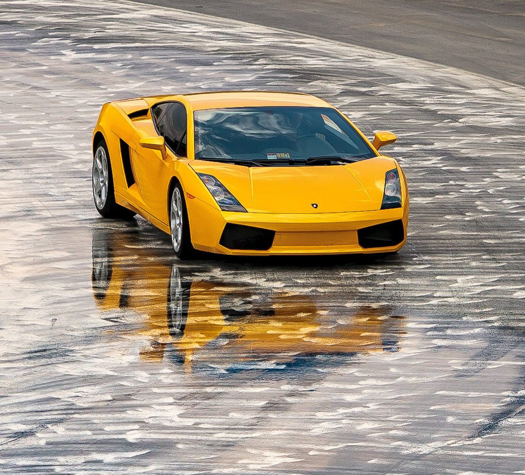 Canon EOS-1D Mark II sample photo. Drifting on the slick track photography