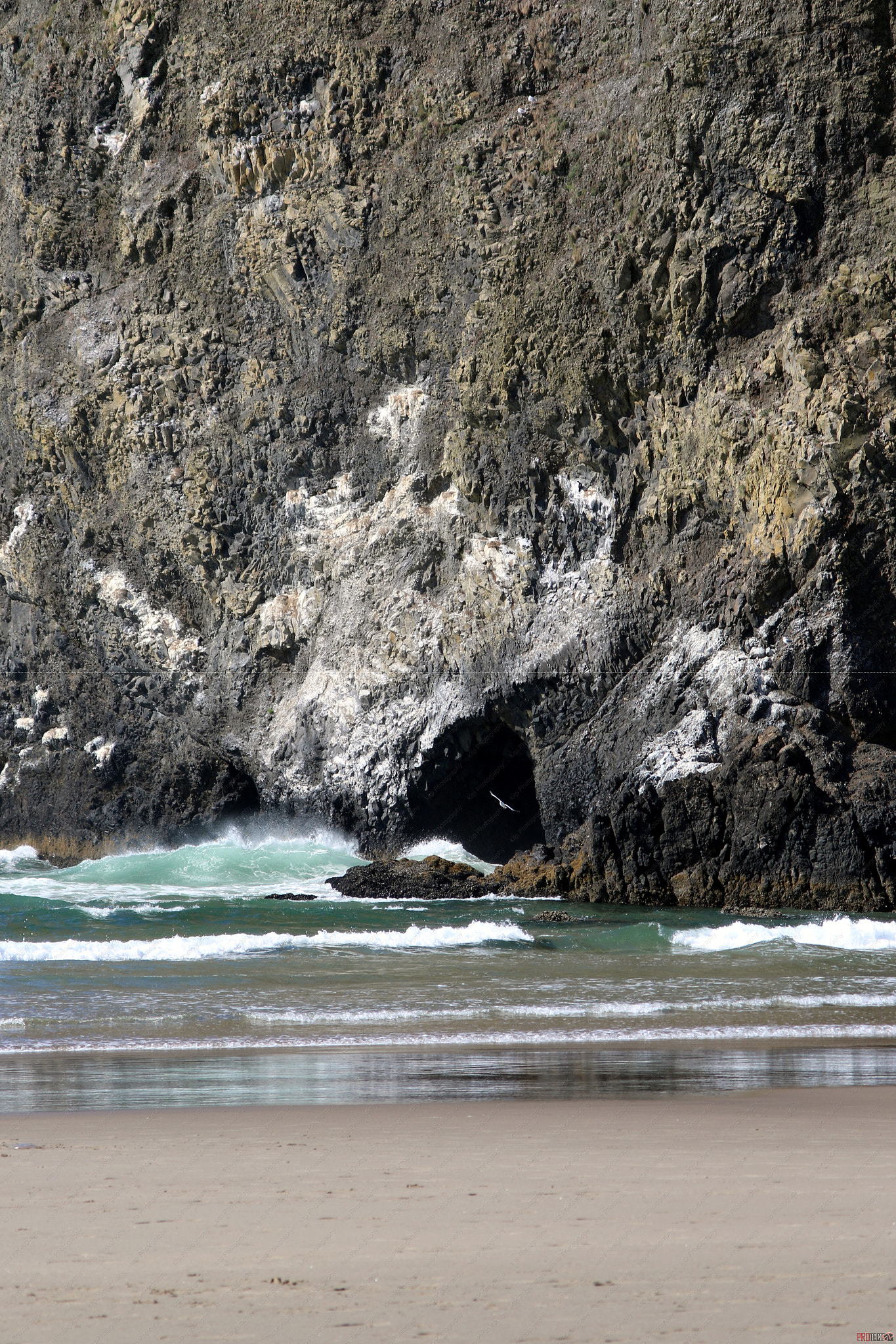 Canon EOS 7D Mark II + Canon EF 35-105mm f/4.5-5.6 USM sample photo. Rock cave at the beach photography