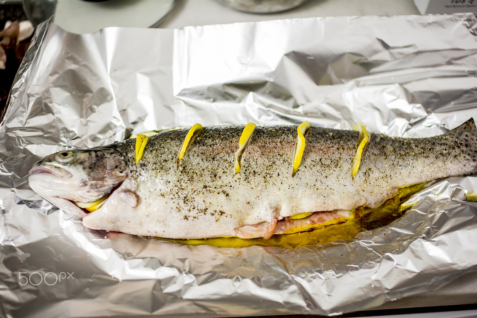 Nikon D7100 sample photo. Fish on foil ready to get toasted oven makes a difference photography