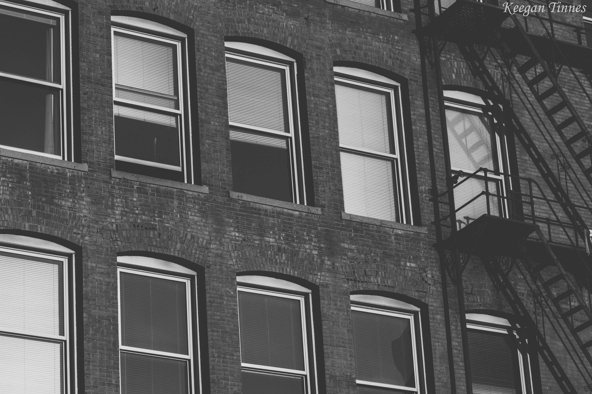 Canon EF-S 55-250mm F4-5.6 IS sample photo. B&w city photography