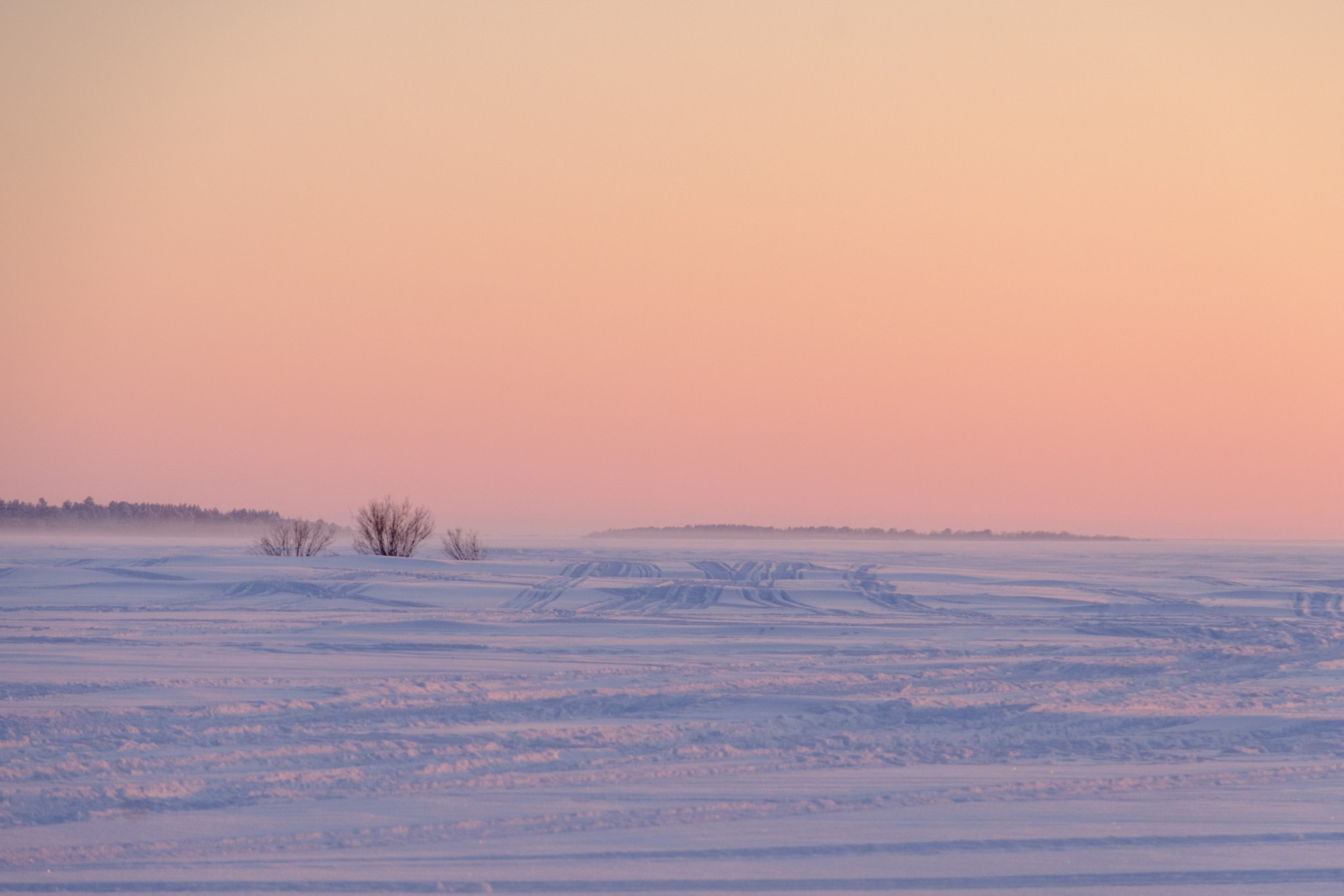Fujifilm XF 18-135mm F3.5-5.6 R LM OIS WR sample photo. Fog on ice while peachy sunset warms the air photography