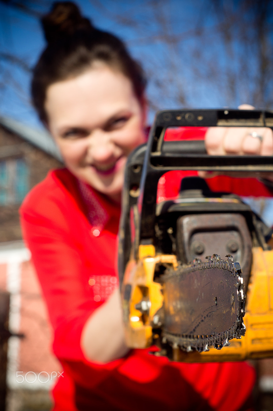 Sony Alpha DSLR-A580 sample photo. Girl with a chainsaw photography