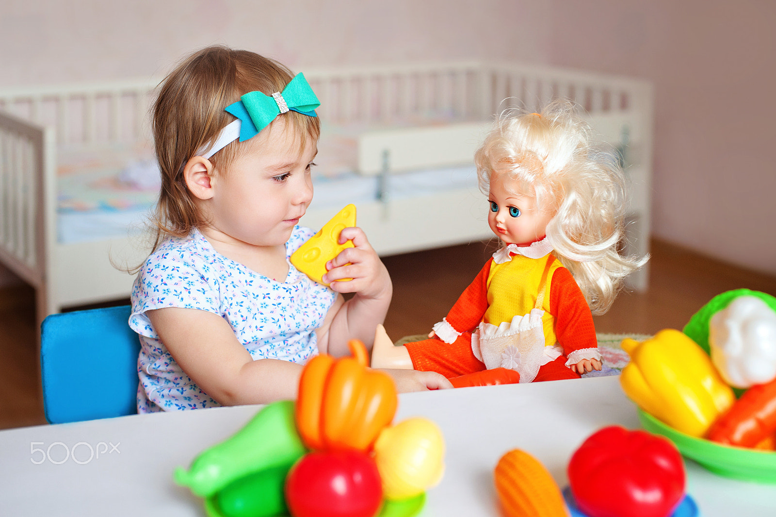 Nikon D700 + Nikon AF Nikkor 50mm F1.4D sample photo. Little girl playing indoors at home or kindergarten. adorable smiling little child cutting... photography