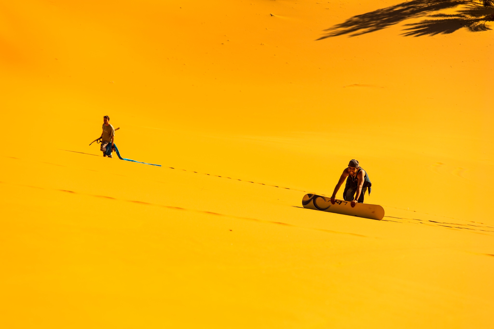 Sigma 70-200mm F2.8 EX DG Macro HSM II sample photo. Merzouga the golden dunes sandboarders photography