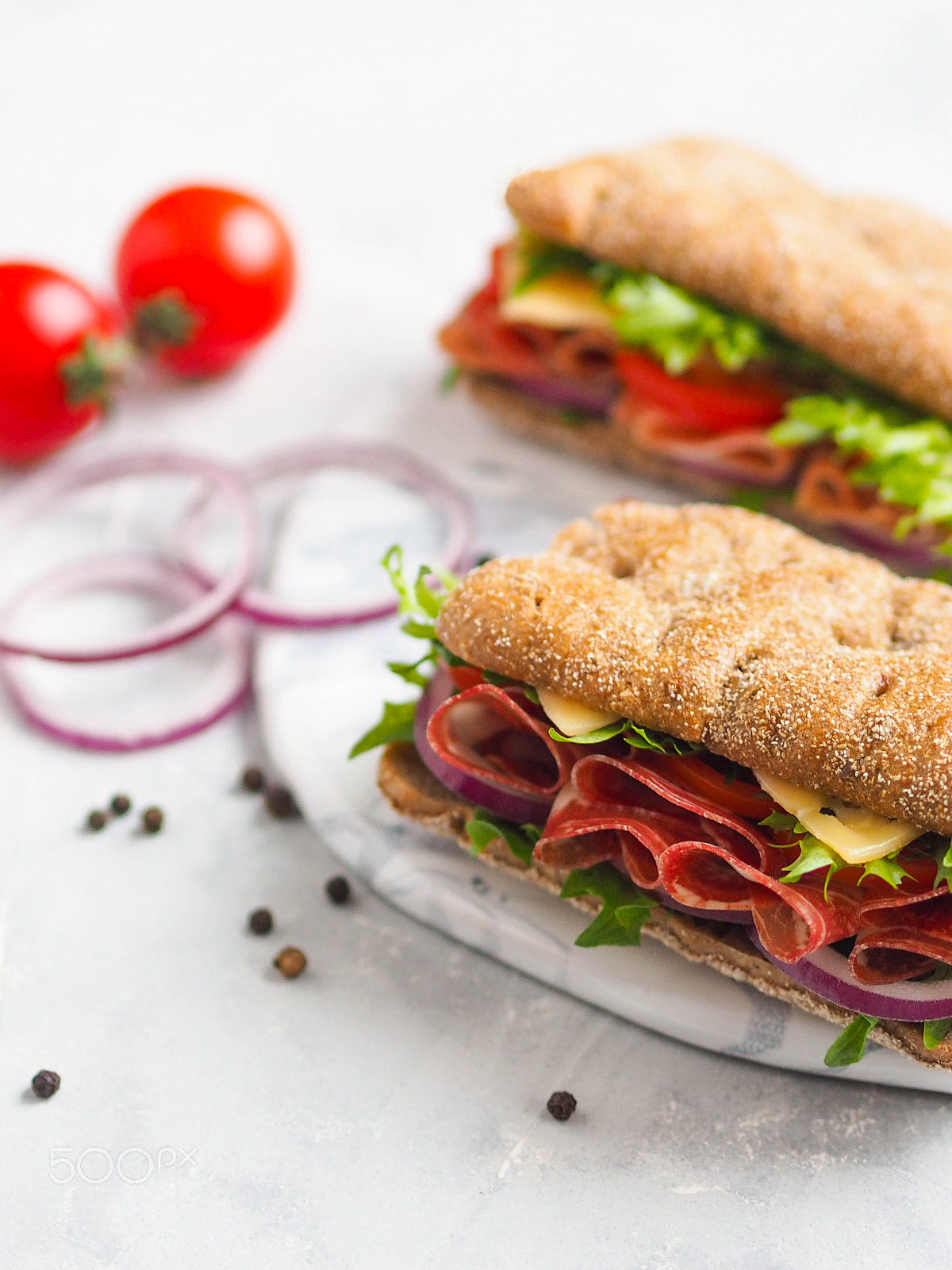 Olympus OM-D E-M10 + Olympus M.Zuiko Digital 45mm F1.8 sample photo. Two fresh sandwiches with jamon, cheese, tomato, l photography