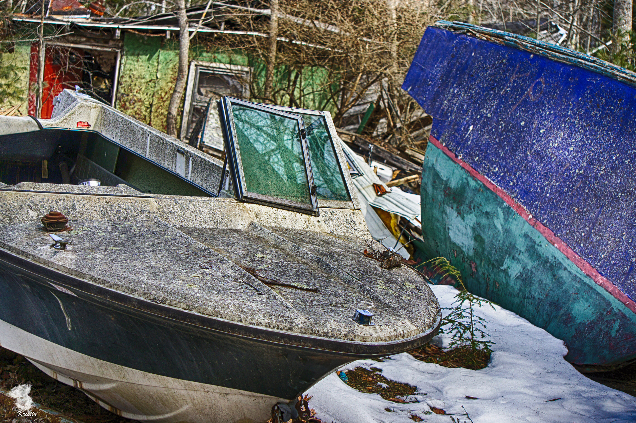 Sony Alpha NEX-3 + Sony E 55-210mm F4.5-6.3 OSS sample photo. Boat graveyard photography