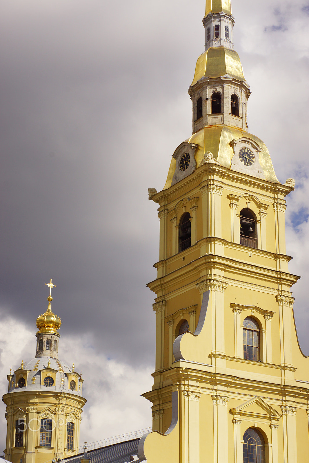 Sony SLT-A65 (SLT-A65V) sample photo. Yellow tower with a bell tower and clock on a background of gloomy sky, sightseeing of st.... photography