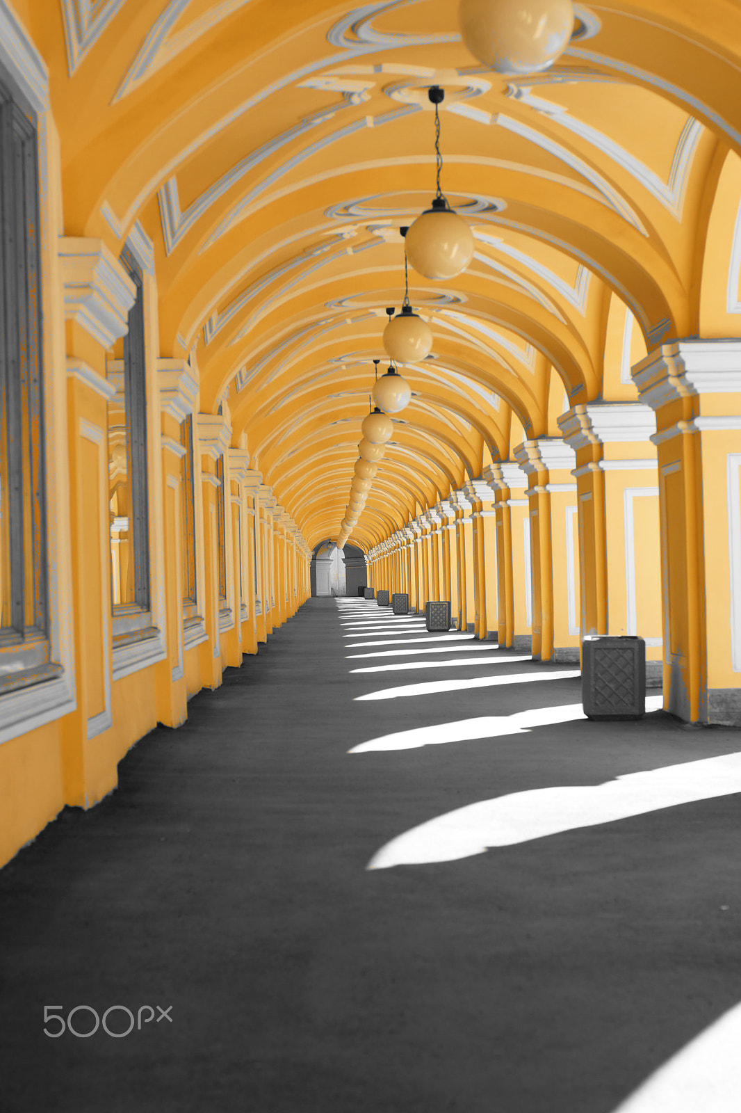 Sony SLT-A65 (SLT-A65V) sample photo. Long street gallery with arches, round lights, light and shadow photography