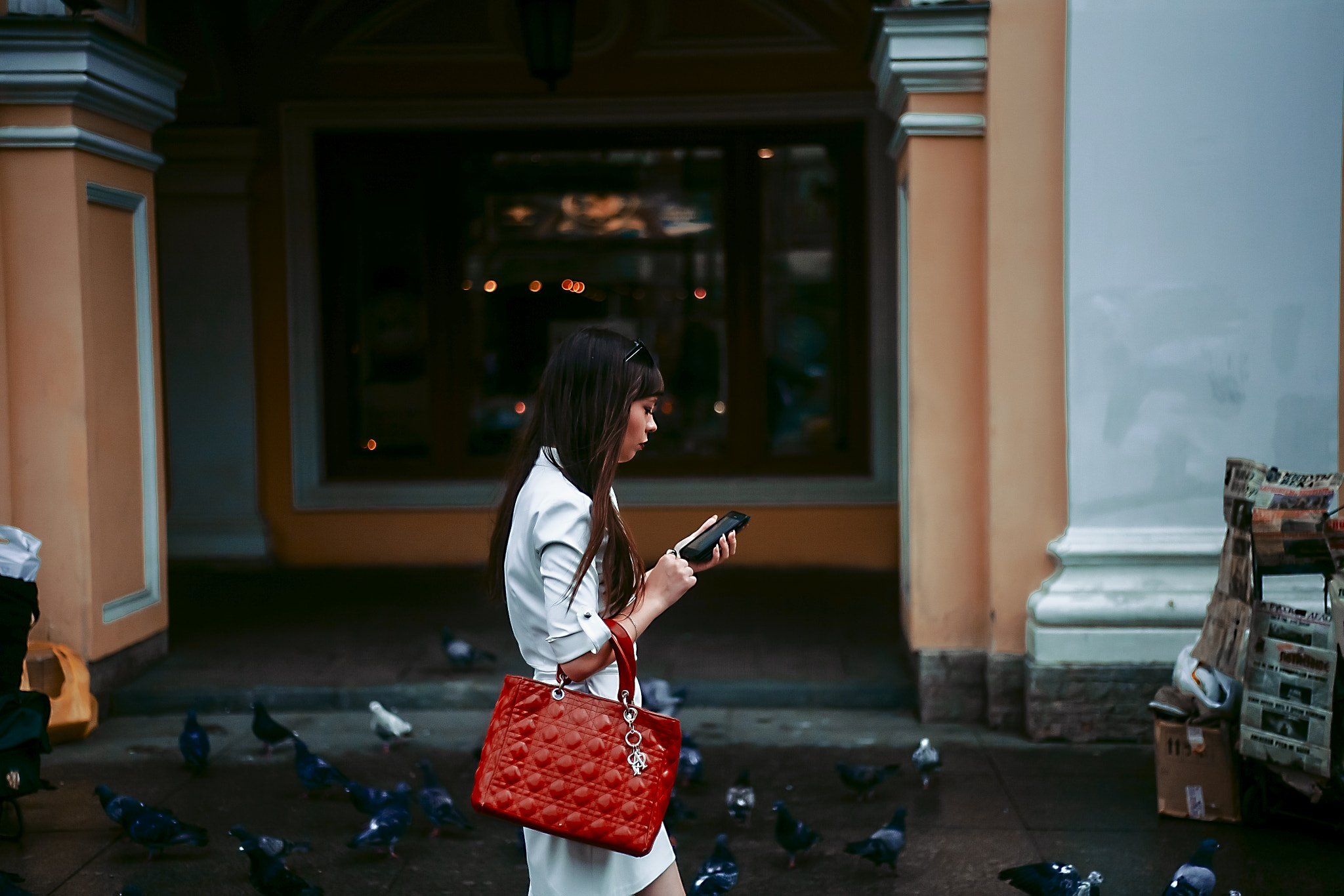 Canon EF 35-80mm f/4-5.6 sample photo. Women with red bag photography