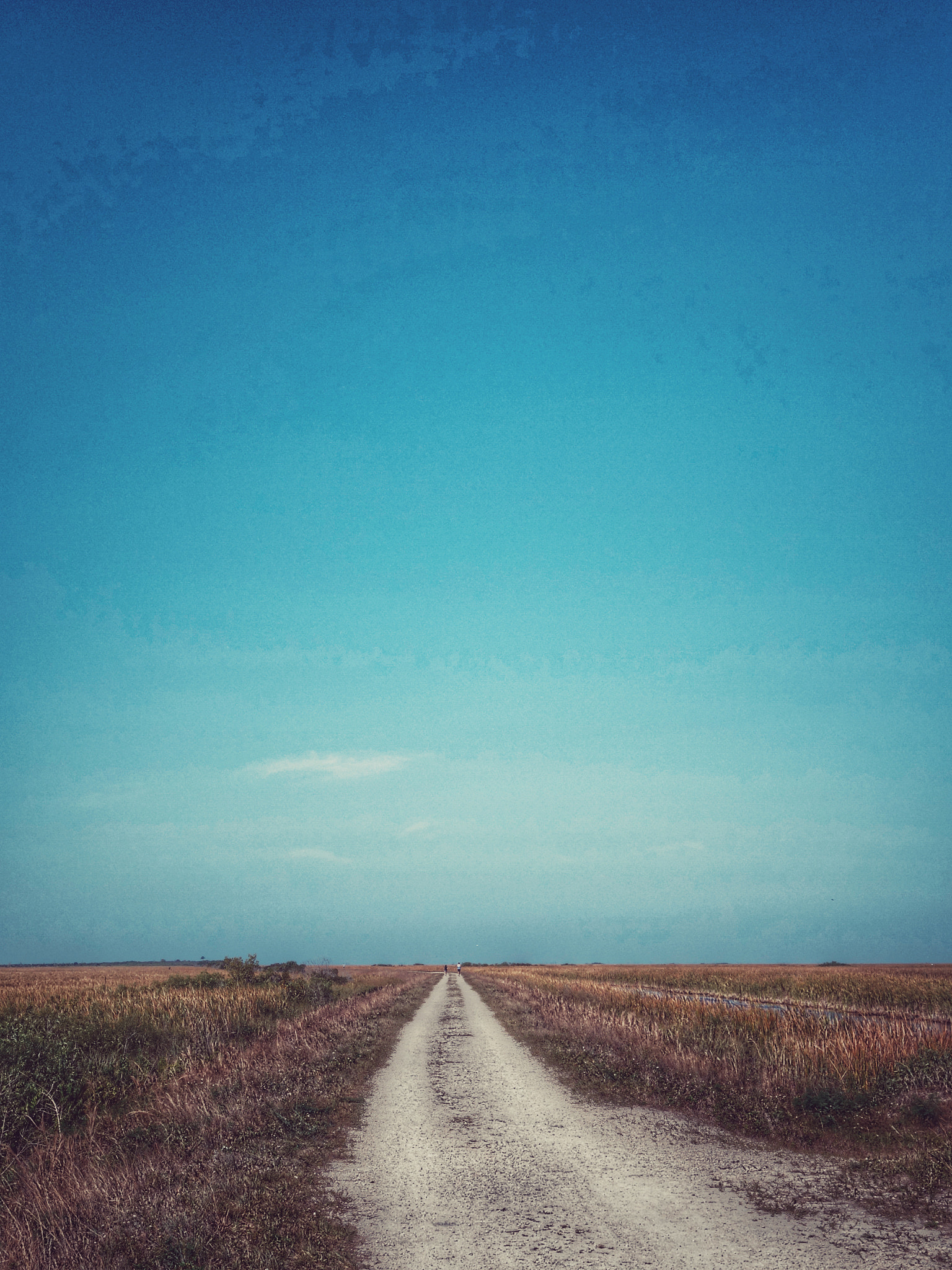 Sony 28-100mm F1.8-4.9 sample photo. The long road photography