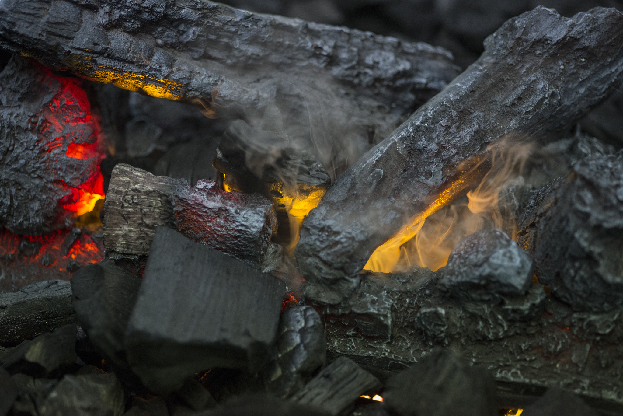 Nikon D800 + Sigma 105mm F2.8 EX DG Macro sample photo. Close up of flames in log fire in cozy warm fire photography
