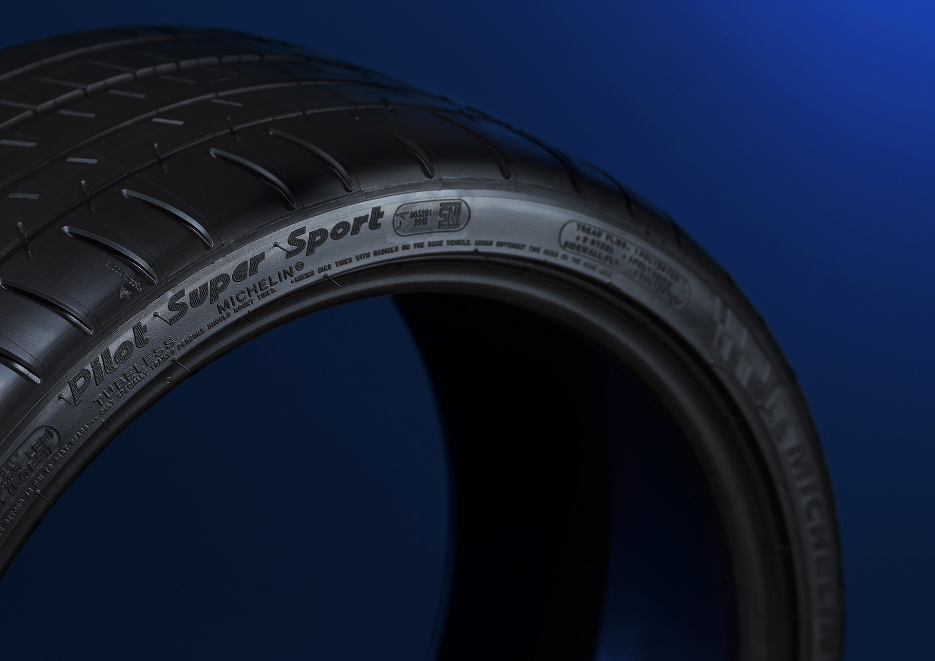 Canon EOS 5D Mark IV + Canon EF 135mm F2L USM sample photo. Michelin pilot super sport tyre on blue photography