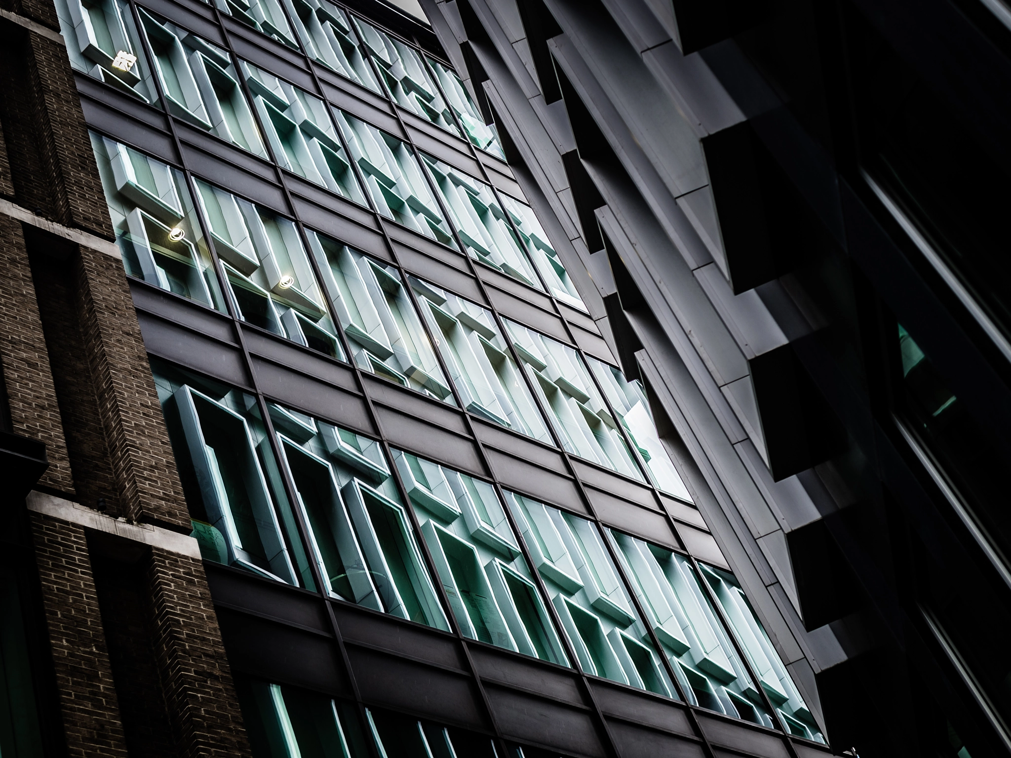 Nikon Df + Nikon AF-S Nikkor 50mm F1.8G sample photo. Looming architecture photography