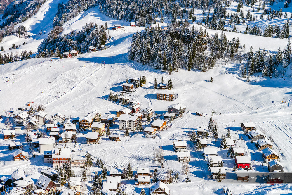 Sony a99 II + Tamron SP 24-70mm F2.8 Di VC USD sample photo. Beautiful winter weather on ski resort in high mountains photography