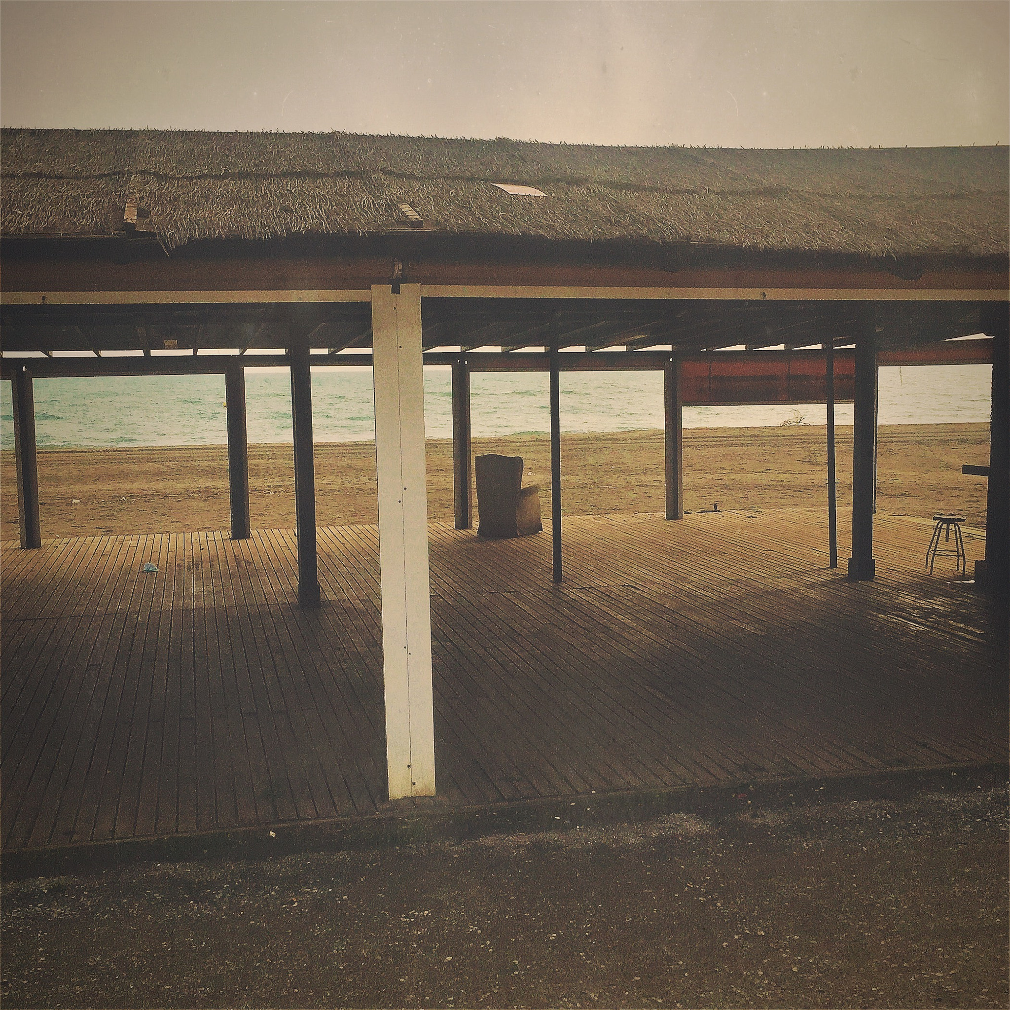 Hipstamatic 331 sample photo. Lone seat by the sea photography