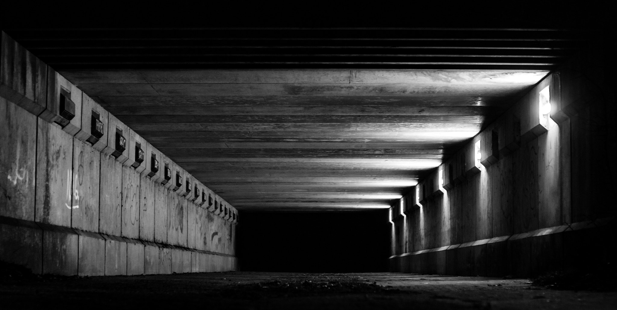 Sony Alpha DSLR-A300 + Sony 50mm F1.4 sample photo. Black and white tunnel photography