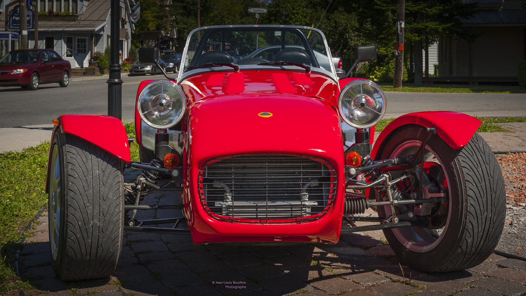 Canon EOS 30D + Canon EF 17-40mm F4L USM sample photo. Exotic red car photography
