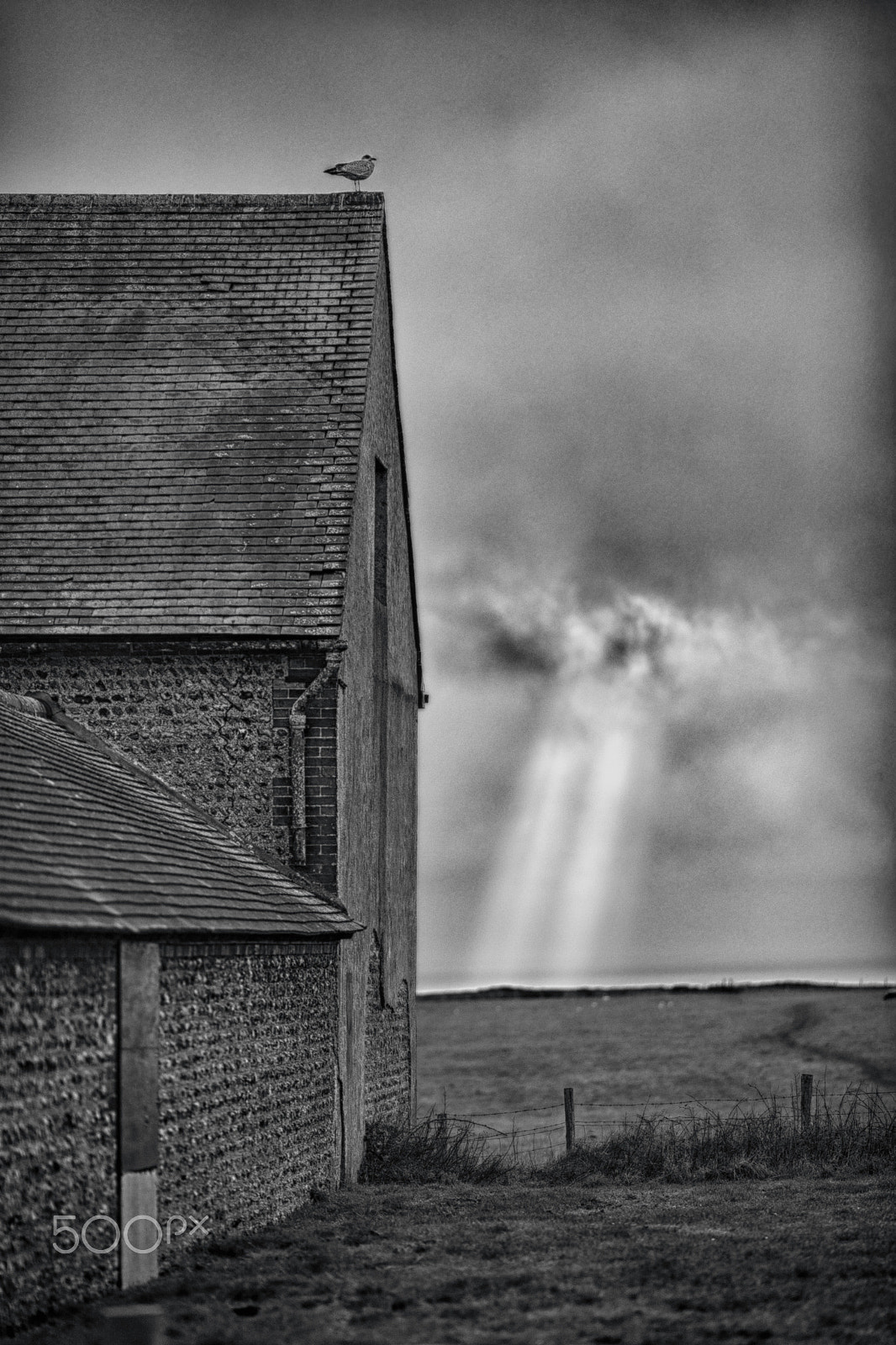 Canon EOS 5D Mark IV + Canon EF 135mm F2L USM sample photo. Streak of light through the clouds photography