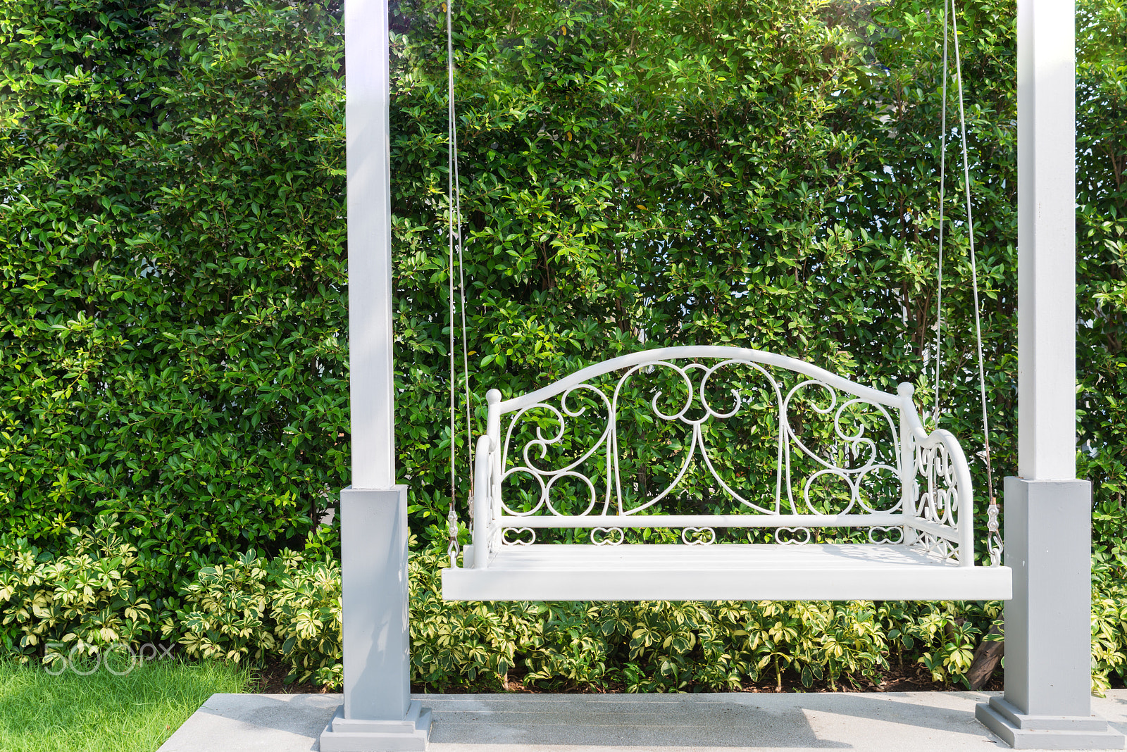 Tamron SP 24-70mm F2.8 Di VC USD sample photo. Front porch with a white porch swing at garden in house. photography