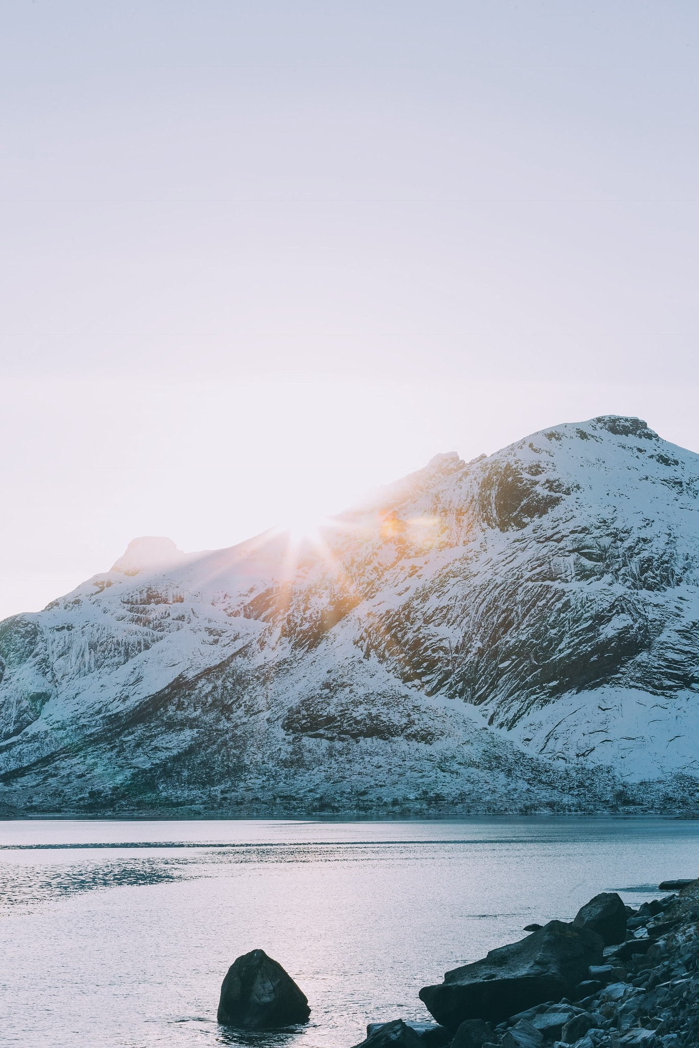 Canon EOS-1D X sample photo. Golden hour sunflares peaking from the mountains photography