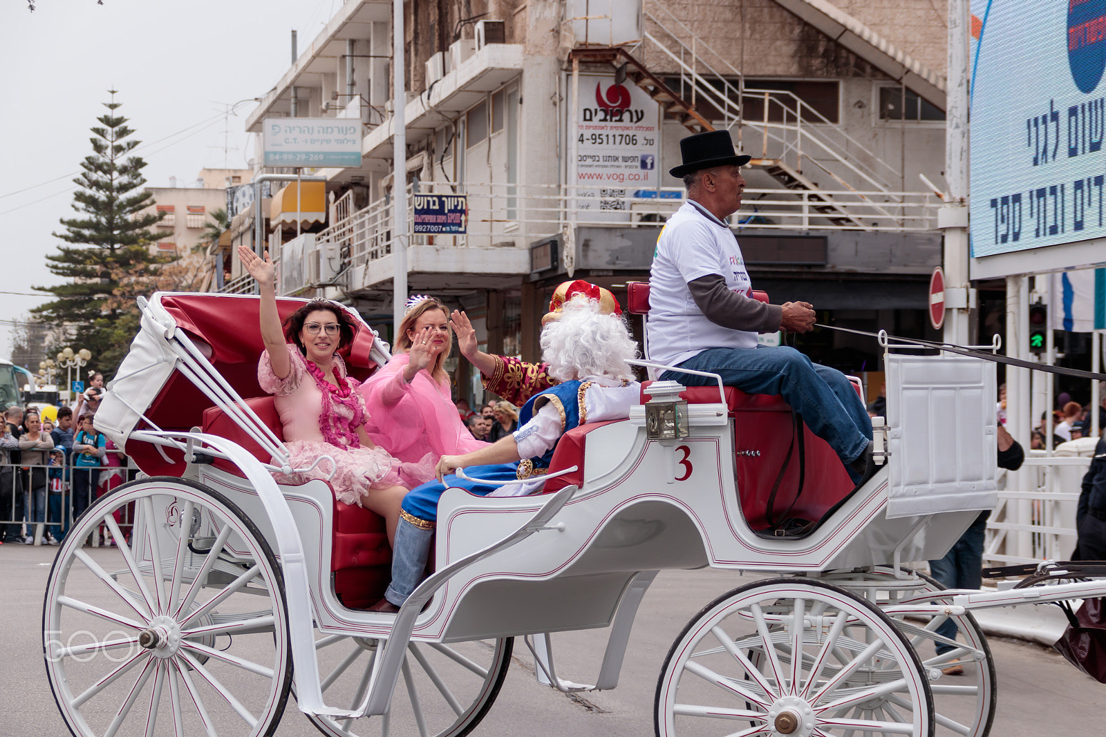 Canon EF 75-300mm F4.0-5.6 IS USM sample photo. Dressed in costumes participants of carnival parade ride in carr photography