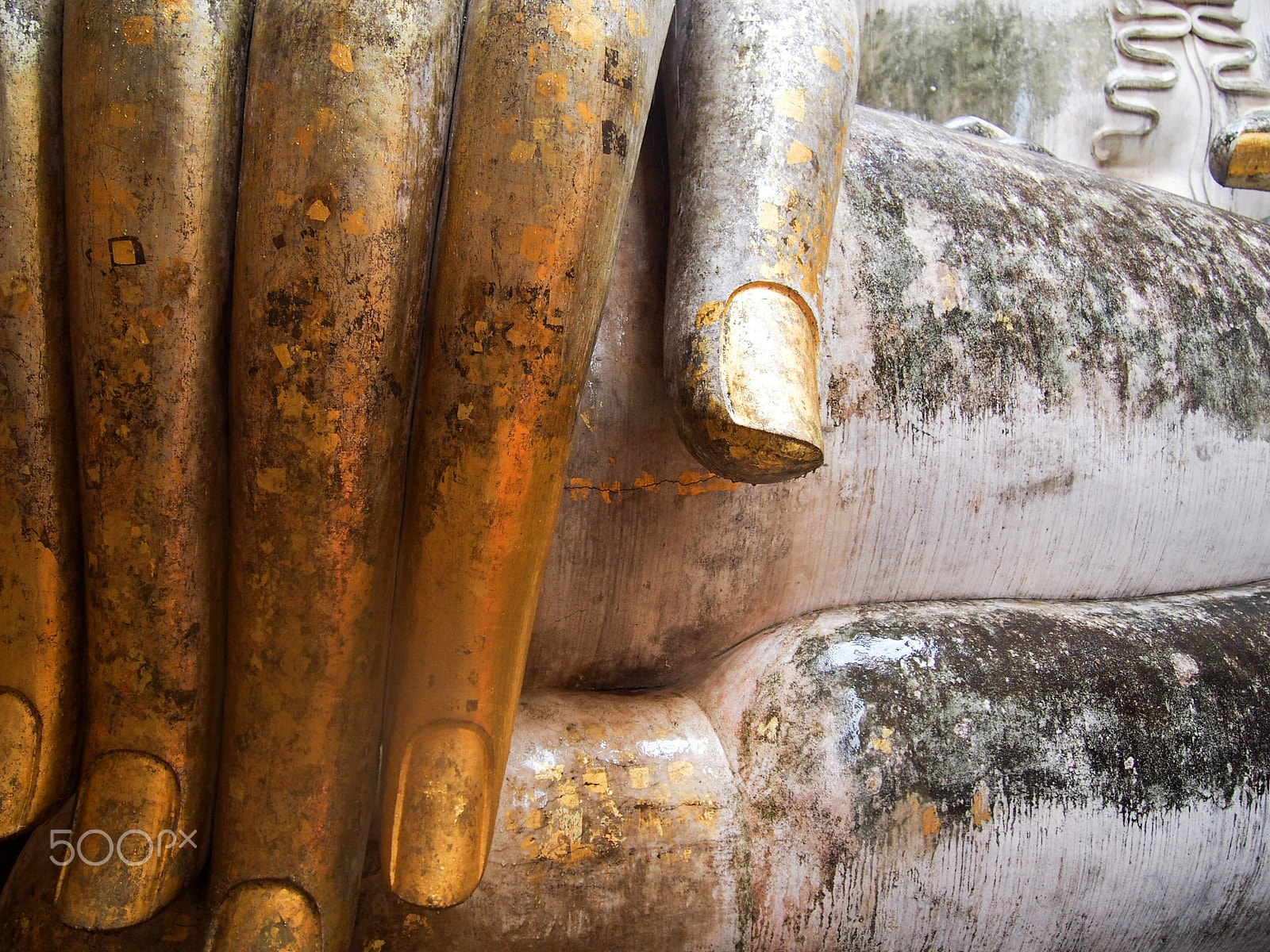 Olympus OM-D E-M5 sample photo. Detail of buddha's hand in sukhothai thailand photography