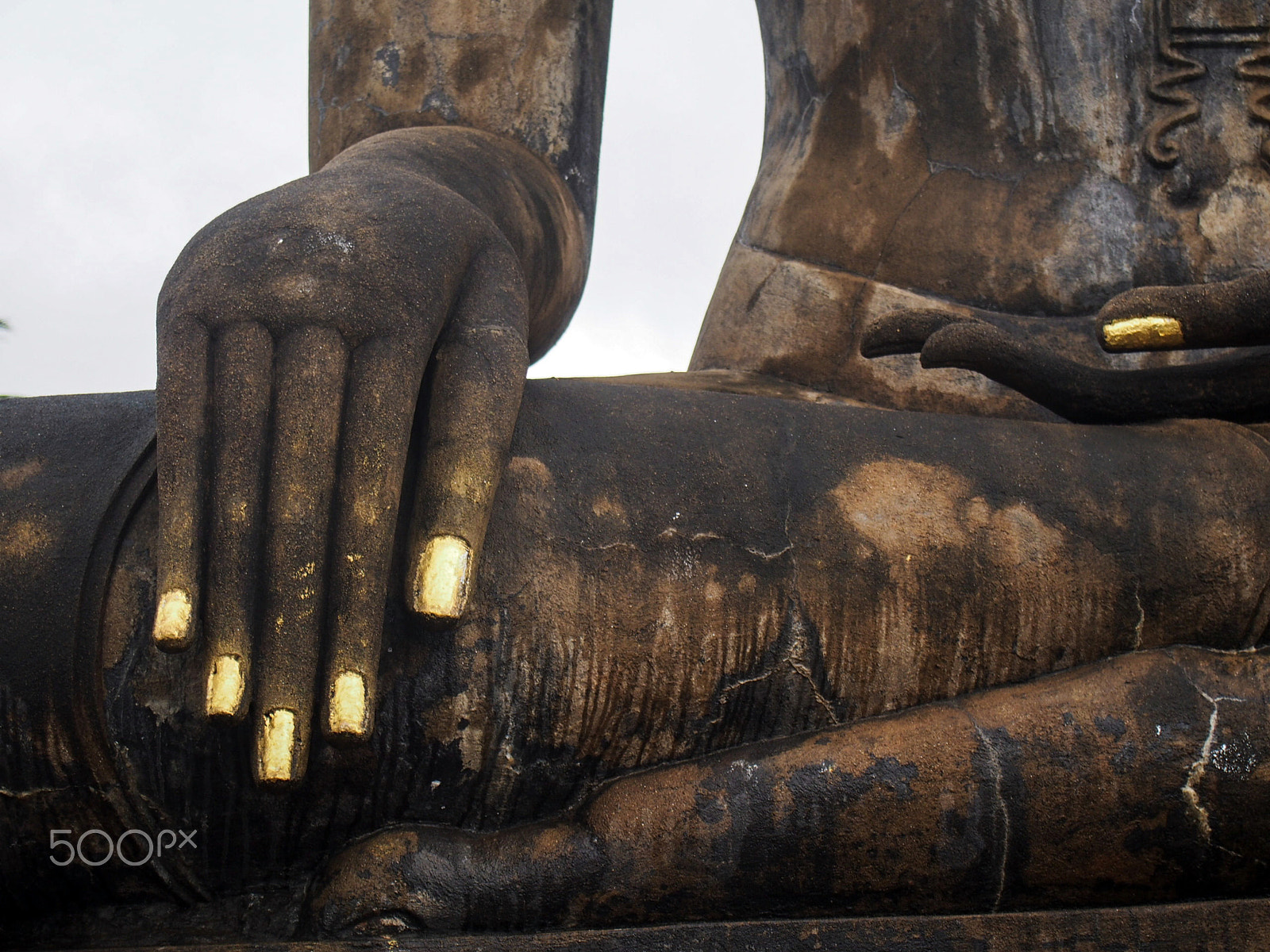 Olympus OM-D E-M5 sample photo. Detail of buddha's hand in sukhothai thailand photography