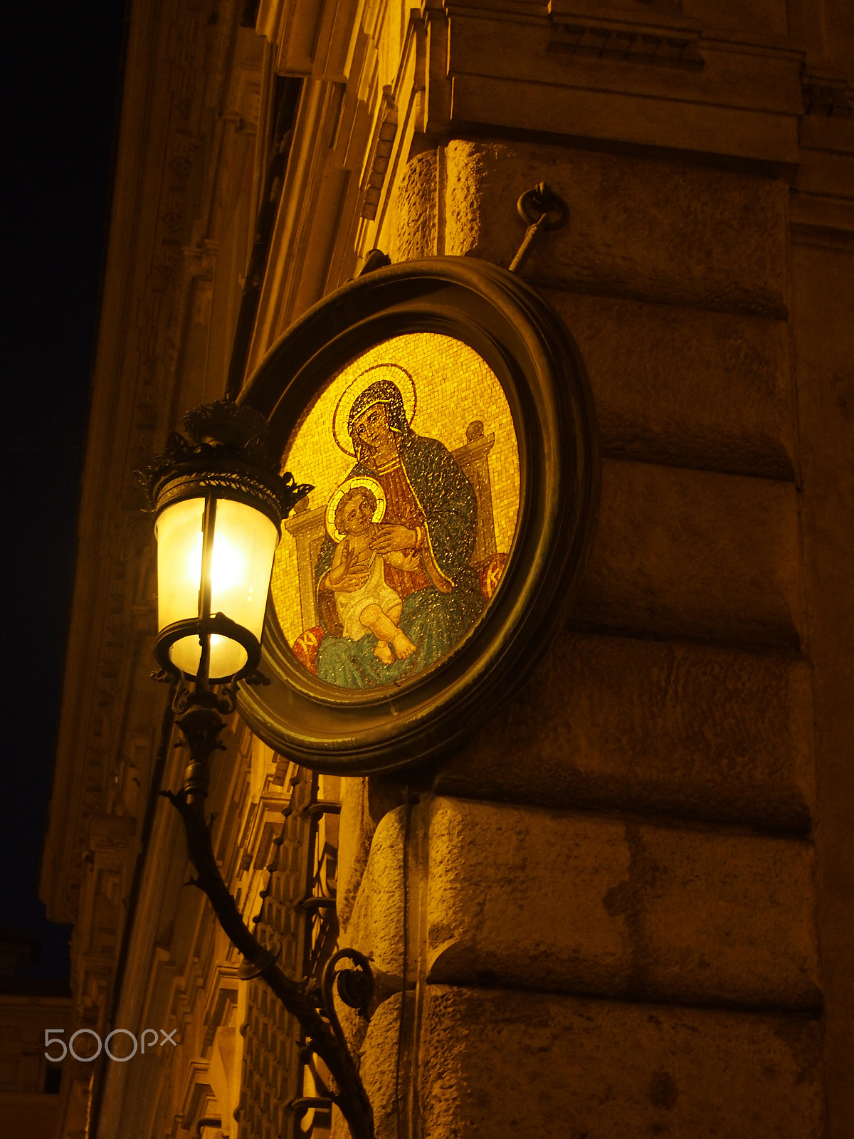 Olympus OM-D E-M5 sample photo. Little madonna or madonnele mosaic light on street corner in rom photography