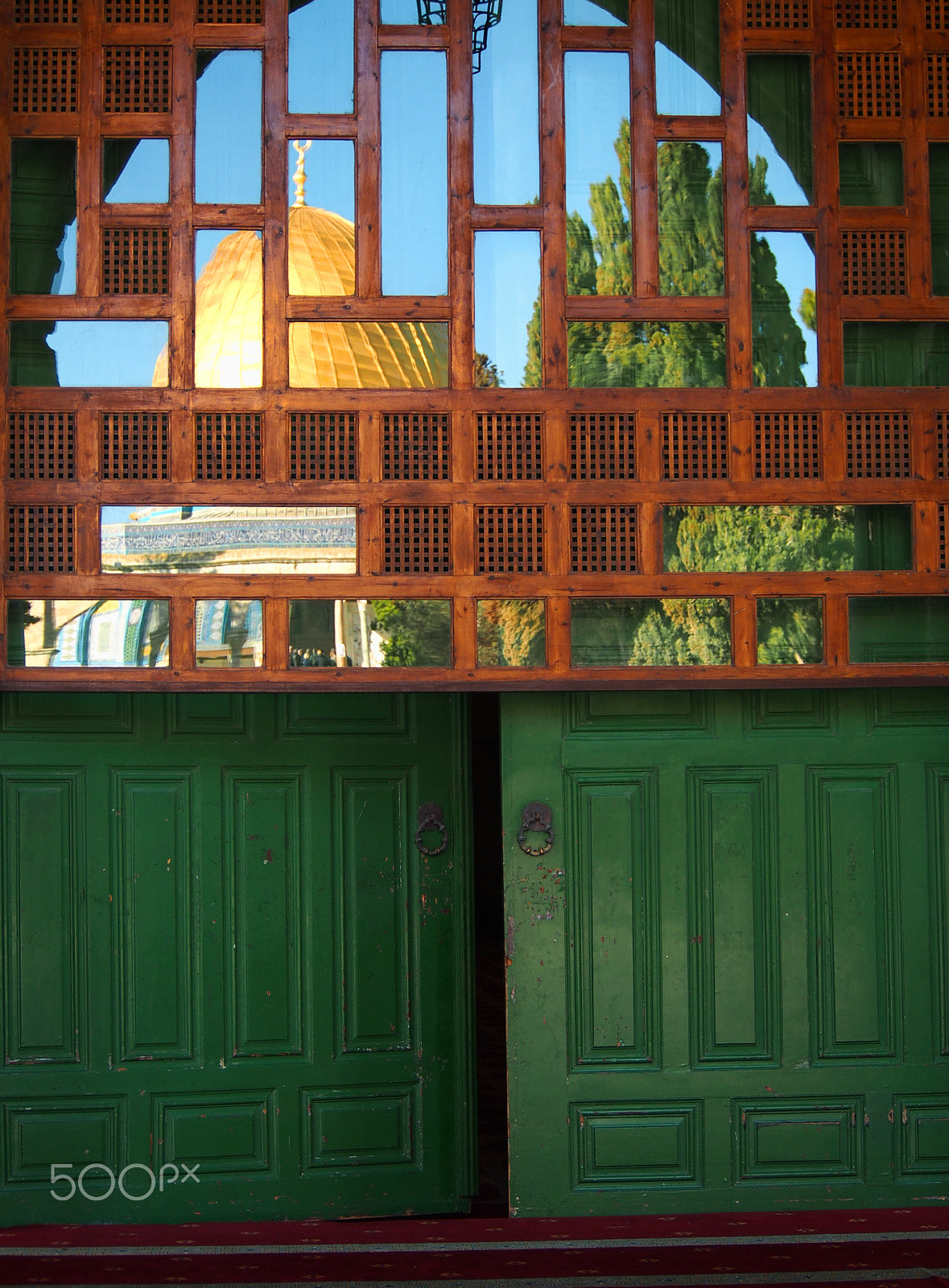 Olympus OM-D E-M5 sample photo. Dome of the rock mosque reflected in window photography
