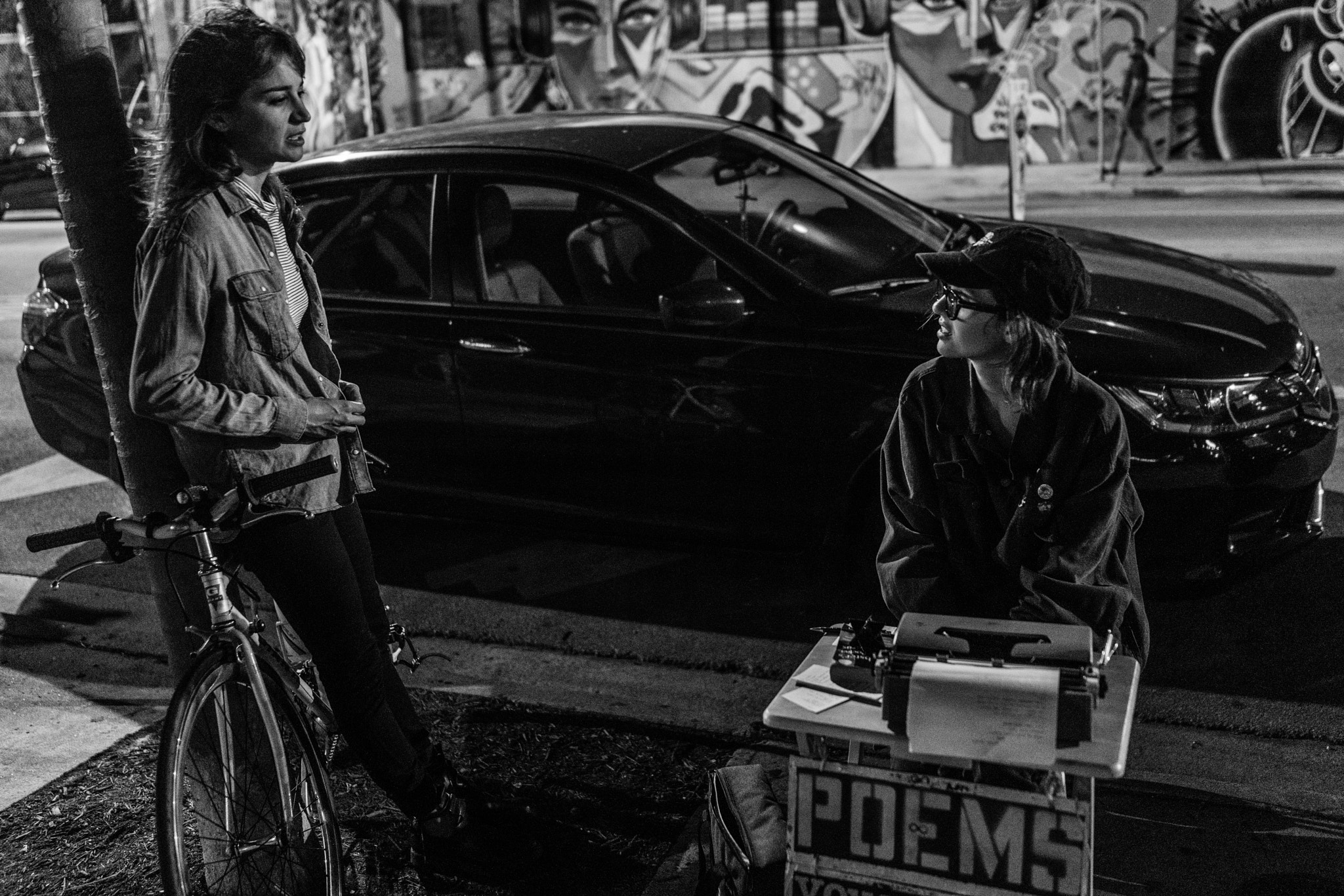 35mm F2.0 sample photo. Miami by night - the poem writer.... photography