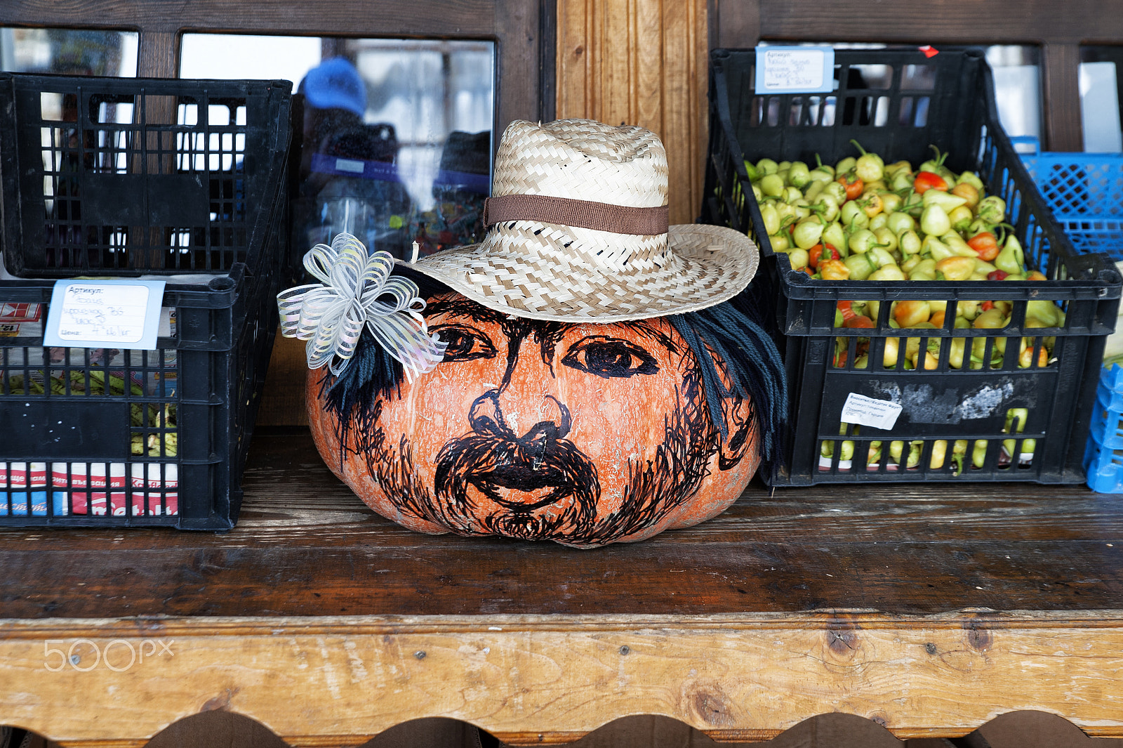 Nikon D700 sample photo. Face painted on a pumpkin exposed in a store. photography