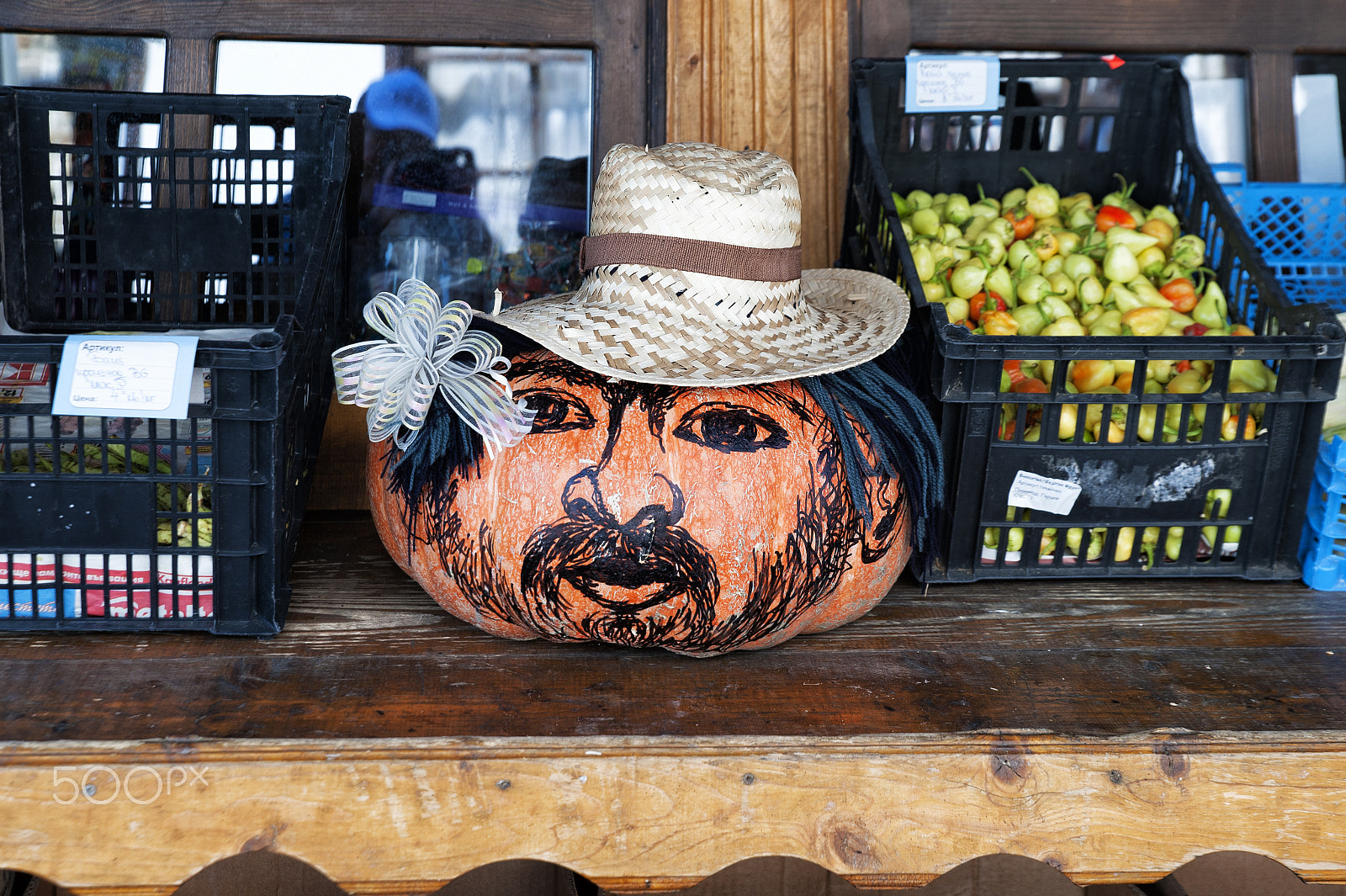 Tamron SP 24-70mm F2.8 Di VC USD sample photo. Face painted on a pumpkin exposed in a store. photography