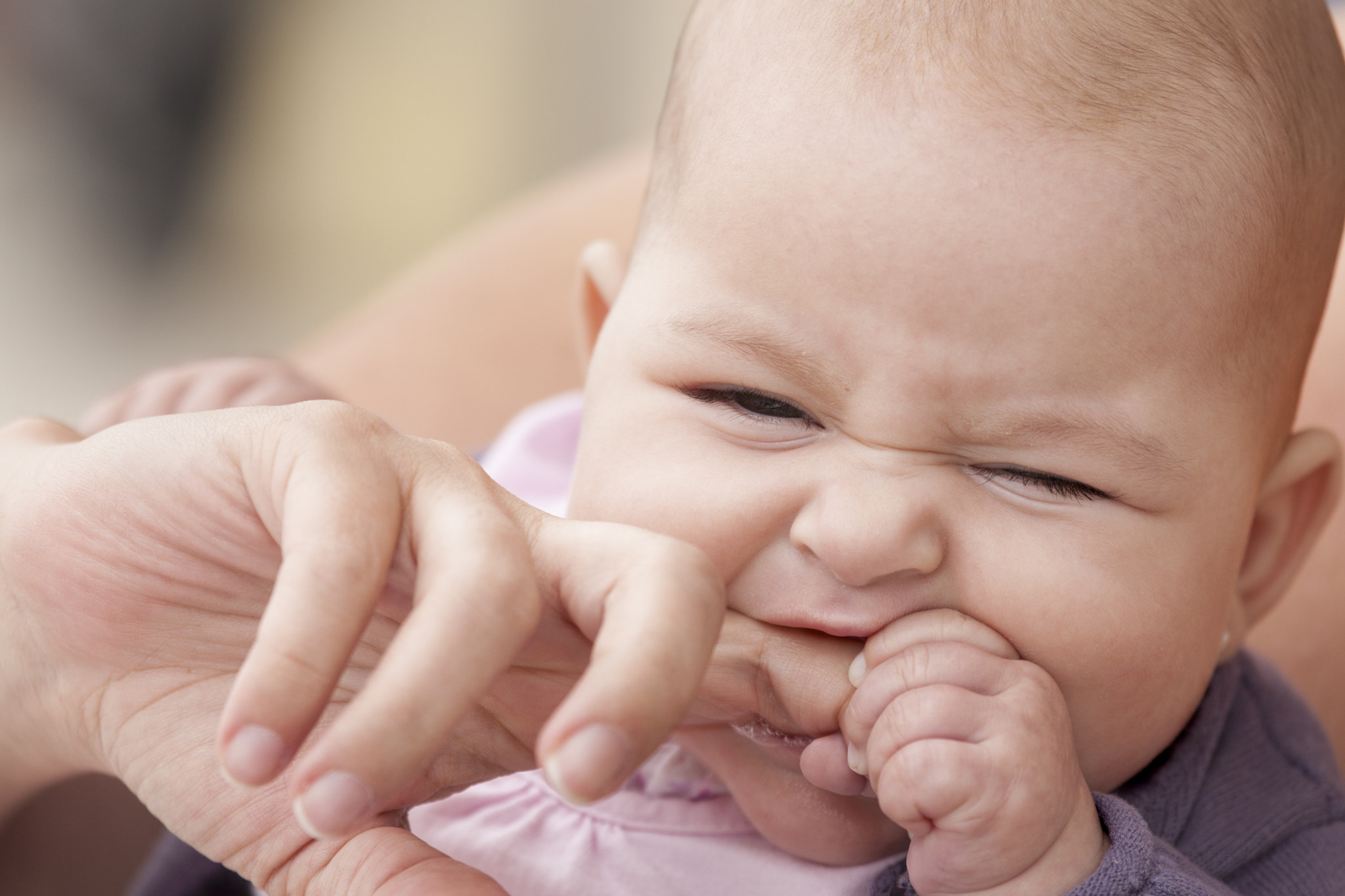 Canon EF 100-400mm F4.5-5.6L IS USM sample photo. Baby biting photography