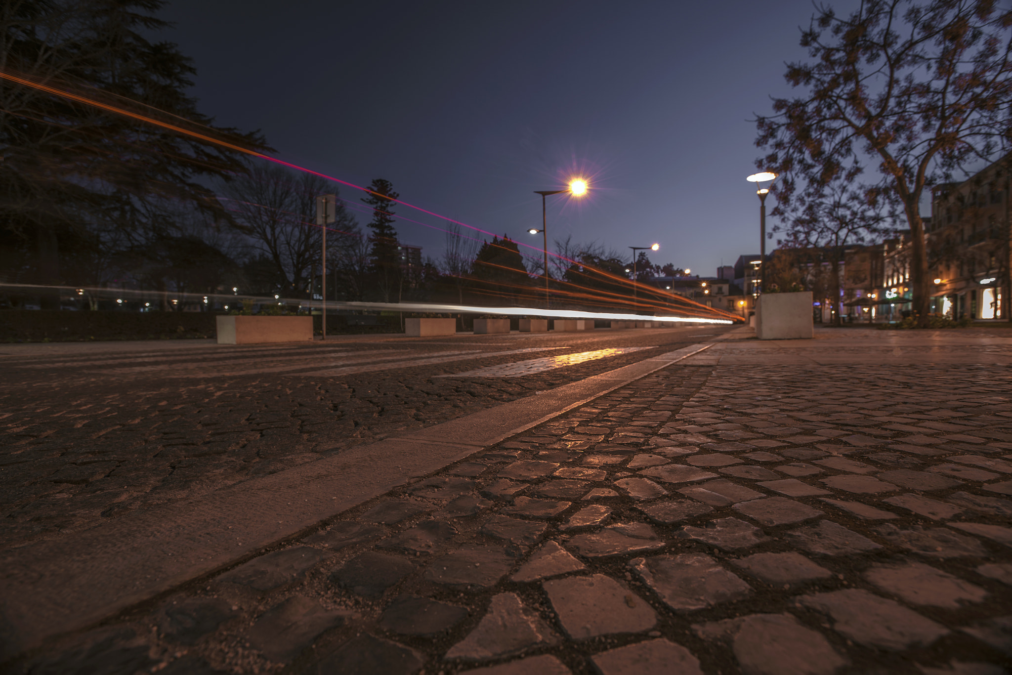 Nikon AF-S Nikkor 17-35mm F2.8D ED-IF sample photo. "sidewalk with light trails" photography