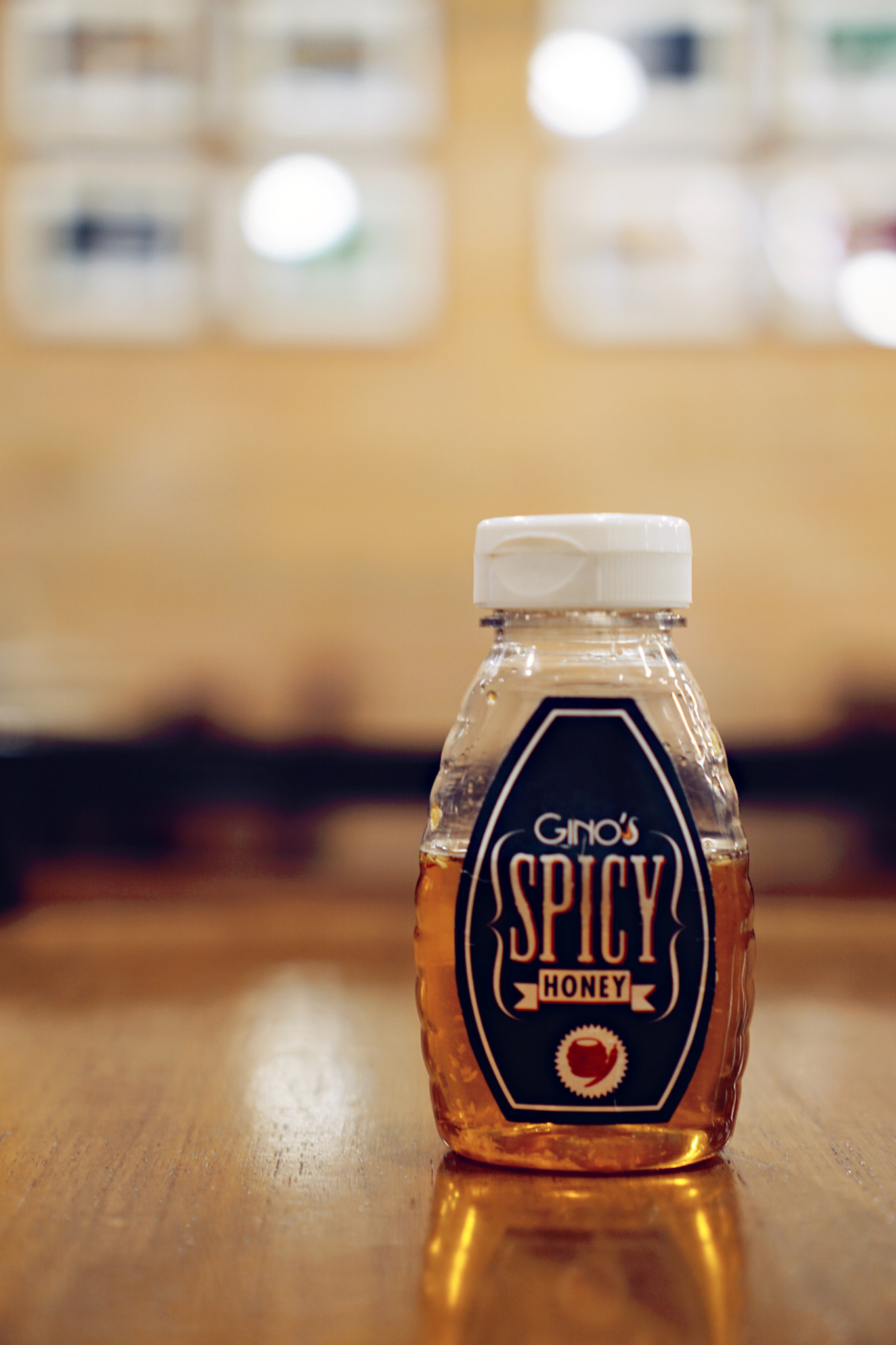 Sony a6000 sample photo. Spicy honey for my pizza photography