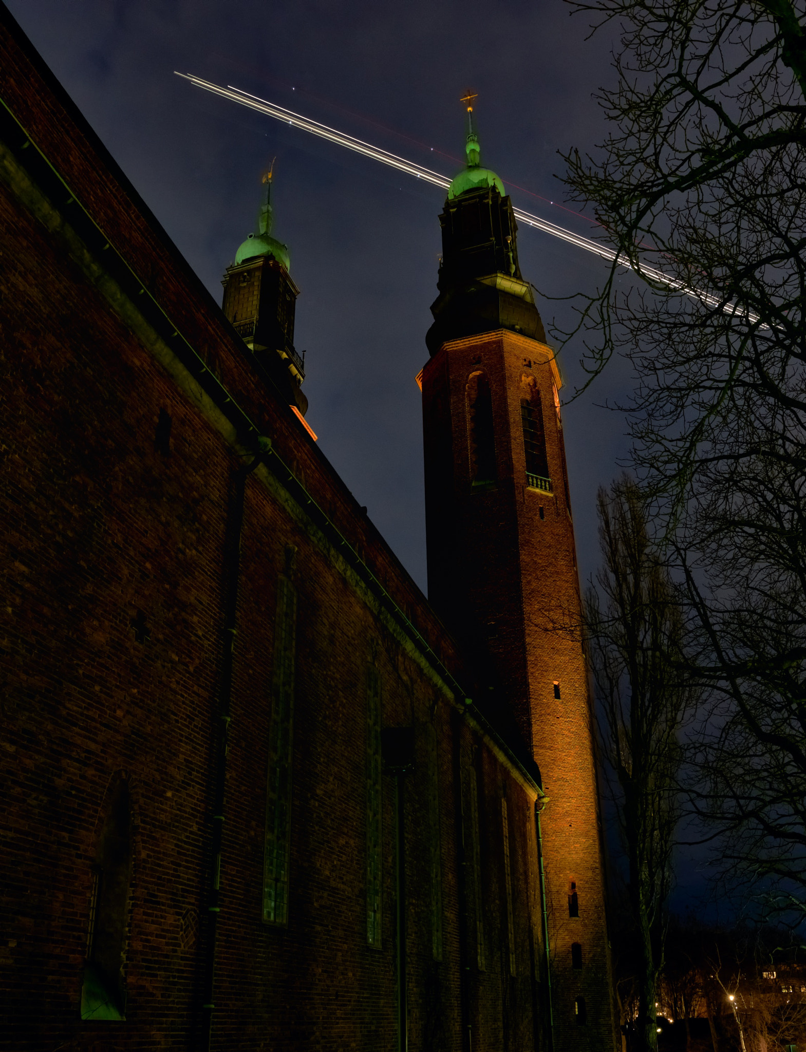Nikon D800E sample photo. Högalids church stockholm - passing airplane ii photography