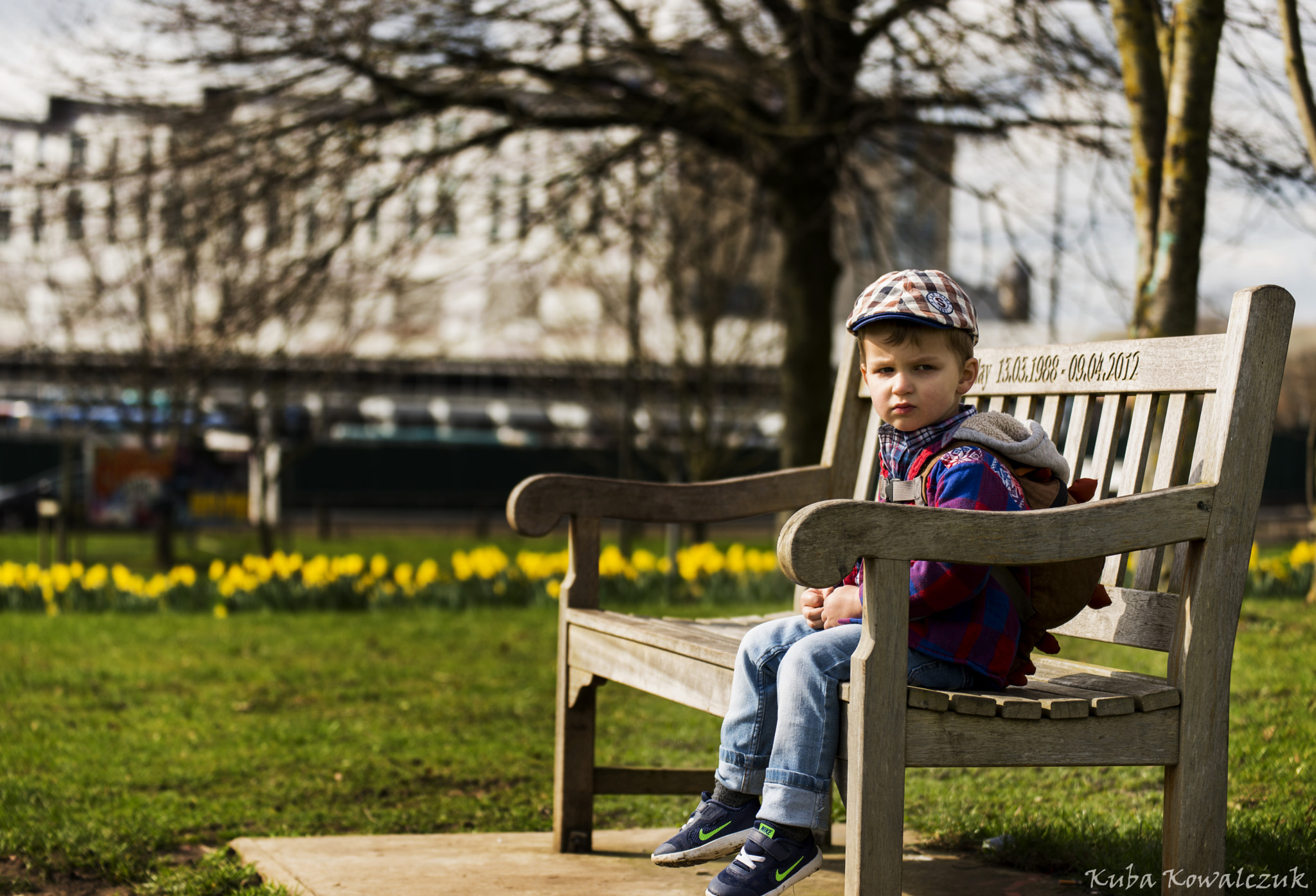 Nikon D610 sample photo. Little boy sit down on the bench photography