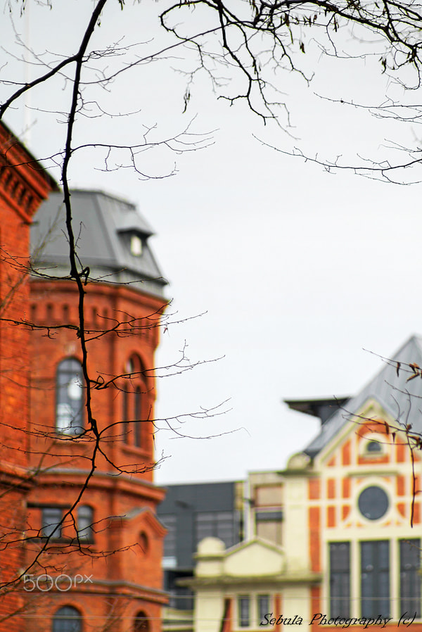 Sony SLT-A37 + Sony 75-300mm F4.5-5.6 sample photo. Old and new industrial town in Żyrardów photography