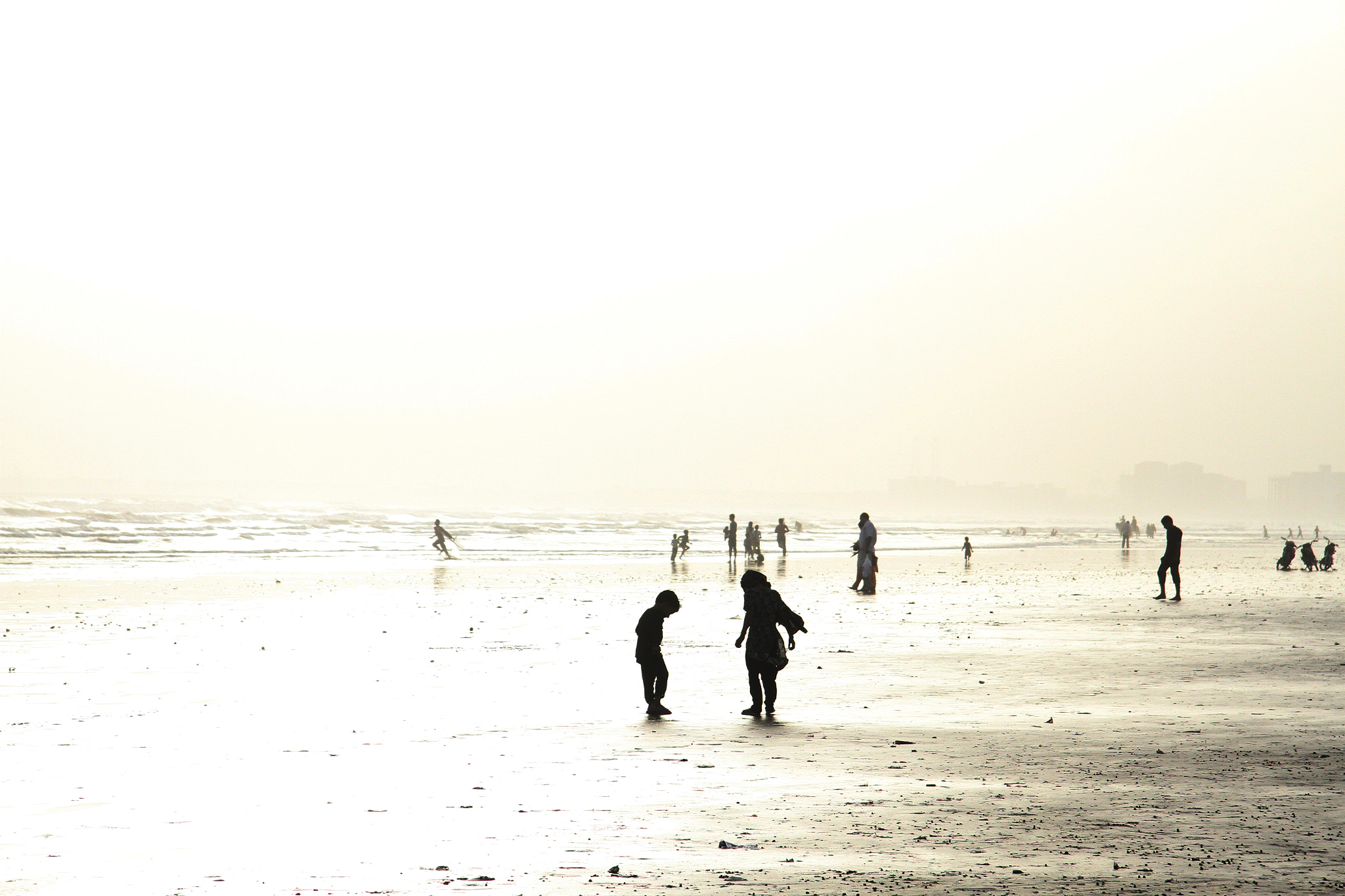 Canon EF-S 17-85mm F4-5.6 IS USM sample photo. Beach silhouettes photography