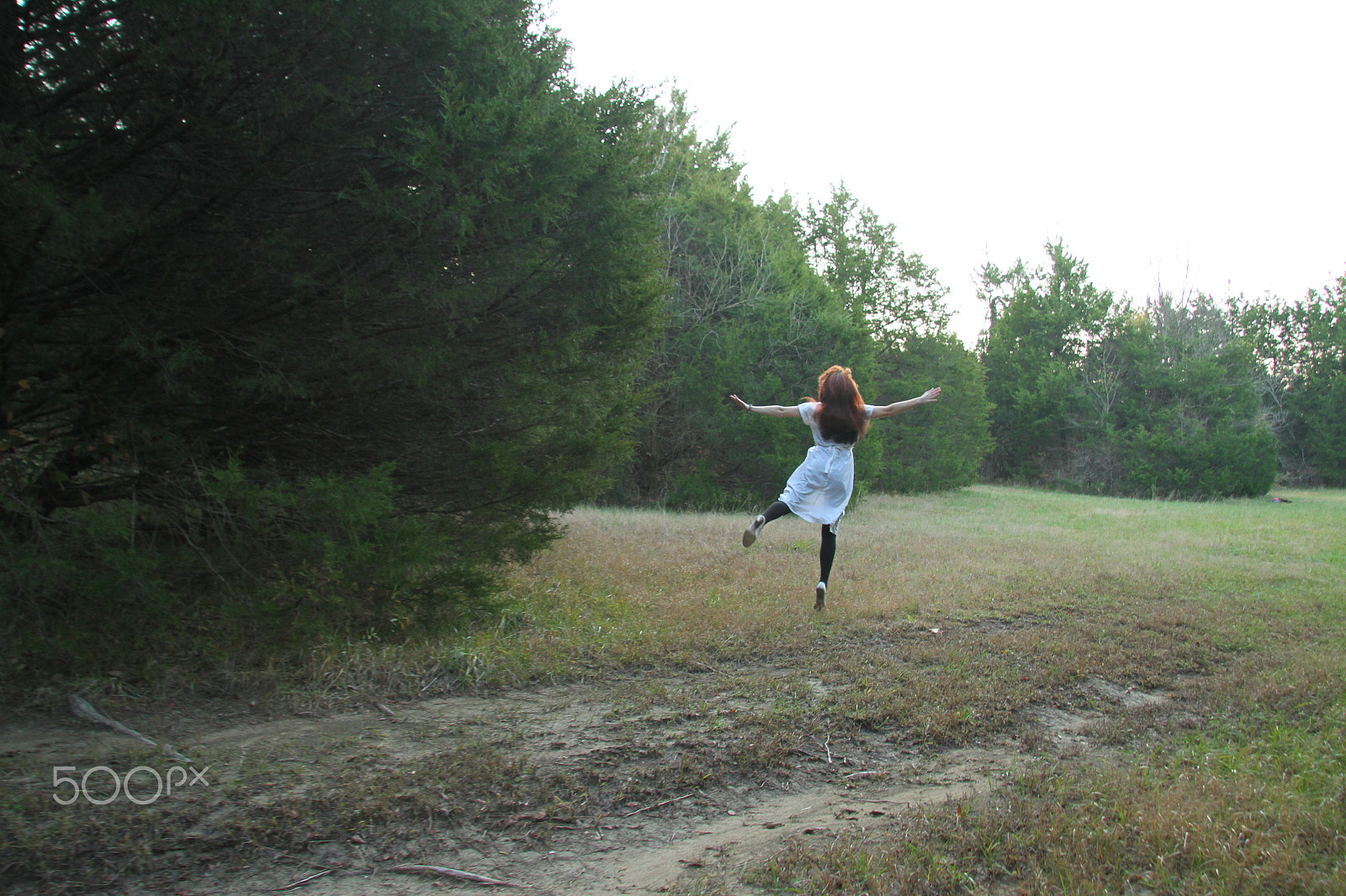 Canon EF-S 17-85mm F4-5.6 IS USM sample photo. Redhead dancing photography