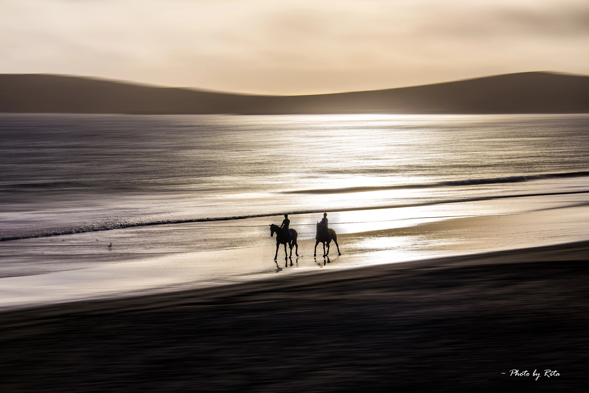 Canon EF-S 18-200mm F3.5-5.6 IS sample photo. Sunset horse ride by the beach photography