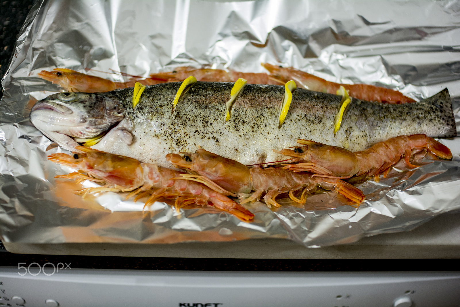 Nikon D7100 + Sigma 30mm F1.4 EX DC HSM sample photo. Fish on foil ready to get toasted oven makes a difference photography