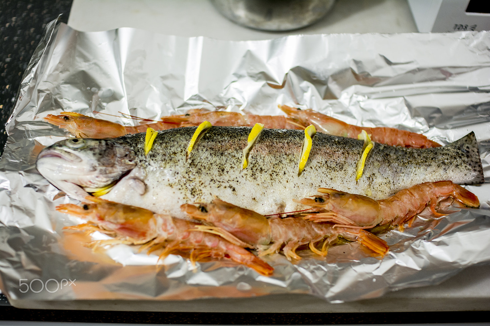 Nikon D7100 sample photo. Fish on foil ready to get toasted oven makes a difference photography