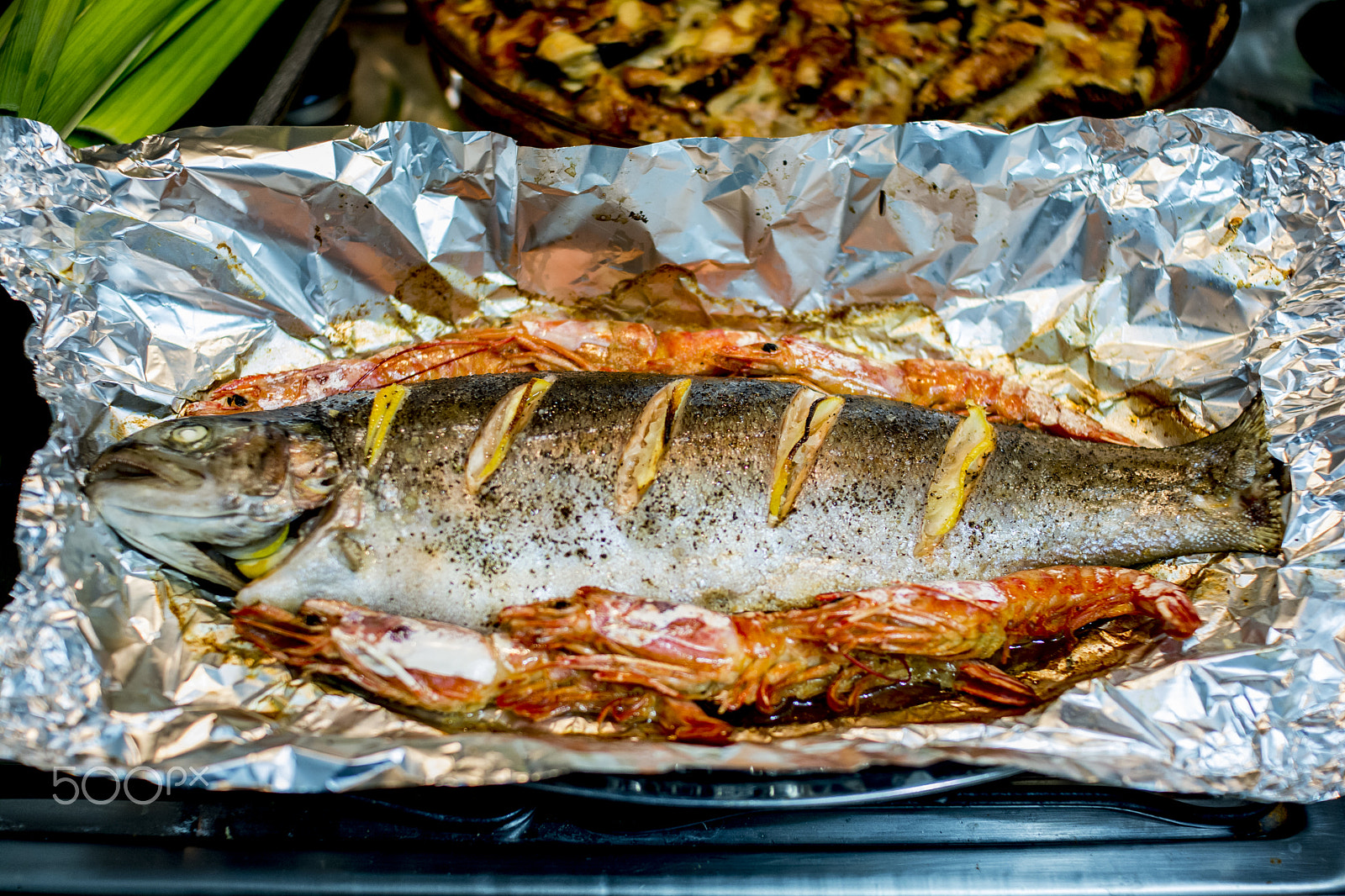 Nikon D7100 + Sigma 30mm F1.4 EX DC HSM sample photo. Fish on foil ready to get toasted oven makes a difference photography