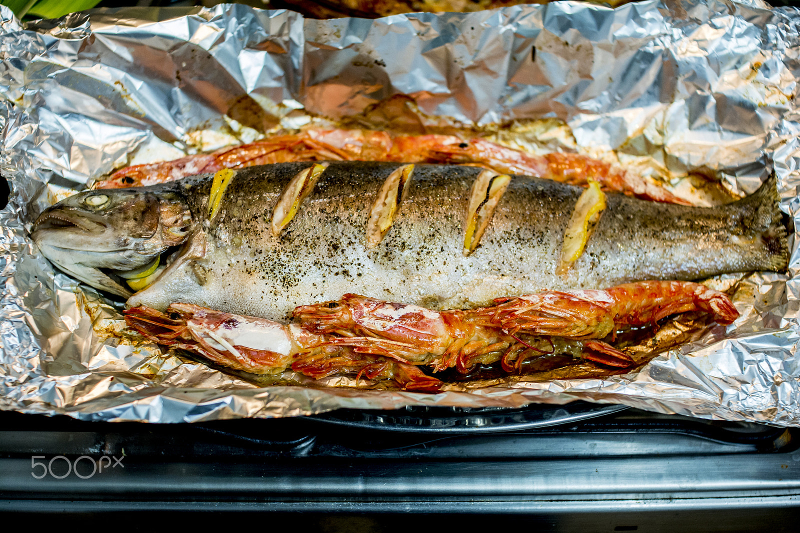 Nikon D7100 sample photo. Fish on foil ready to get toasted oven makes a difference photography