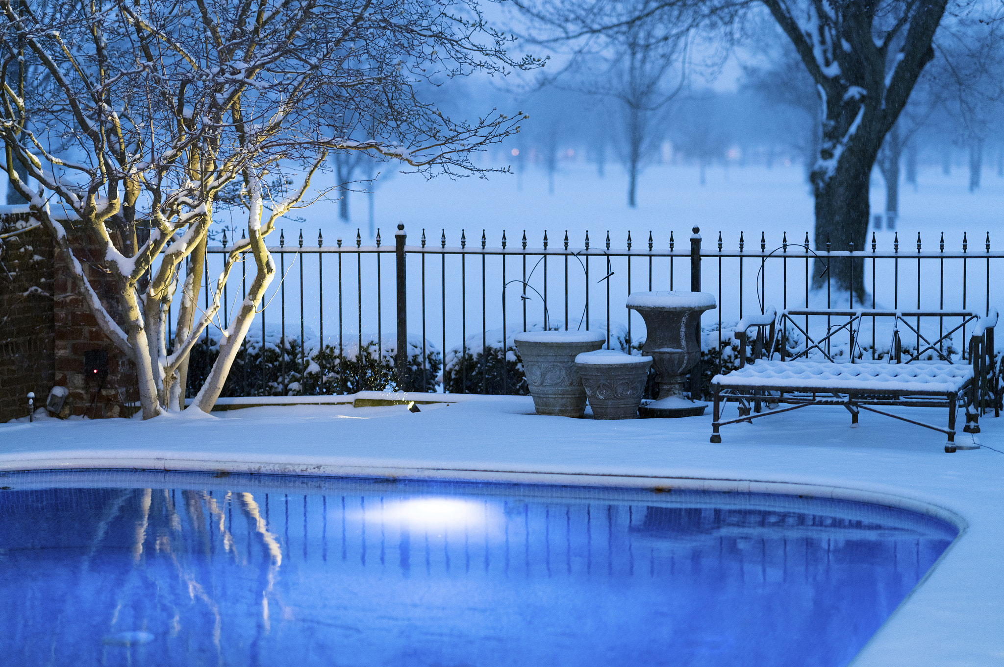 Sony FE 85mm F1.4 GM sample photo. Swimming pool and snow photography