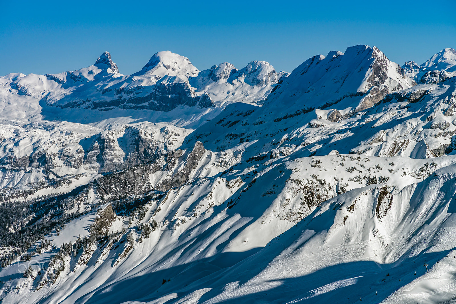 Sony a99 II + Minolta AF 80-200mm F2.8 HS-APO G sample photo. Beautiful mountains in snow. evening aerial view with shadows. photography